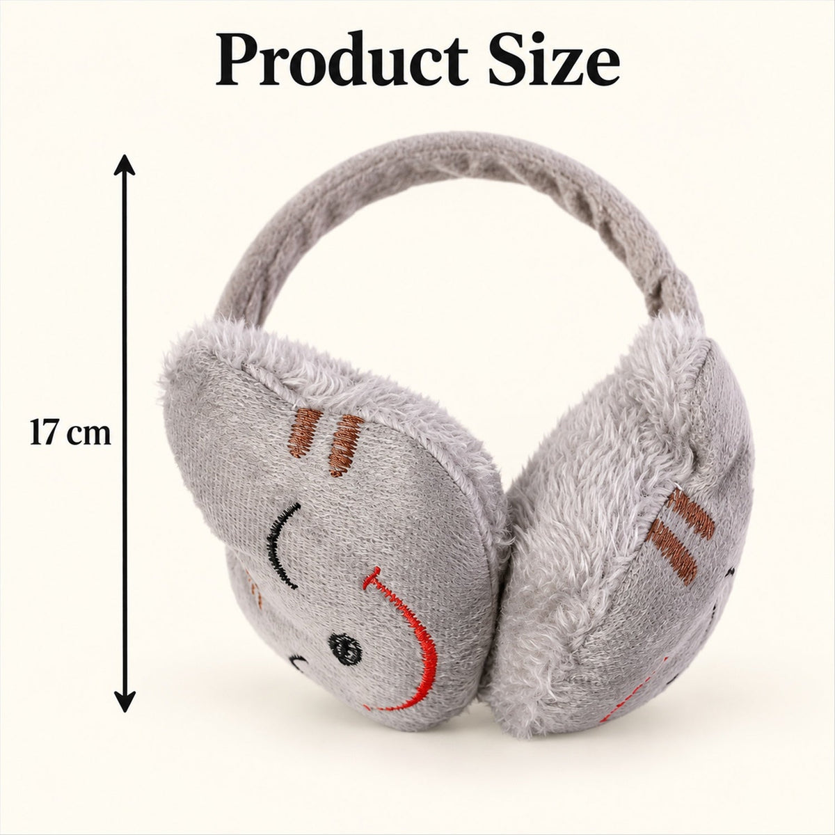 Grey plush earmuffs with a red embroidered smiley face, showing a 17 cm height measurement on a light background.