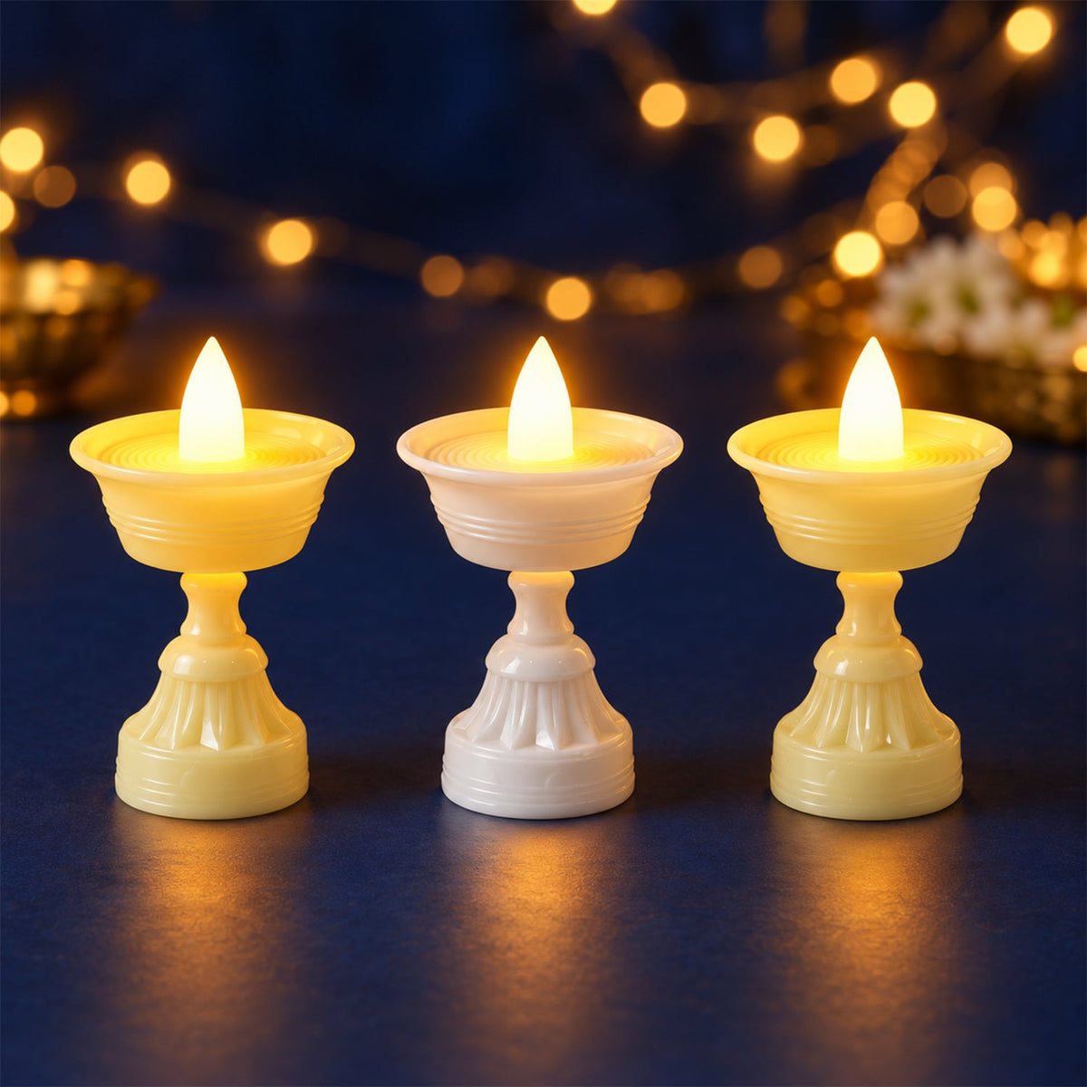 Top view of a flameless LED diya showcasing its flame shape and round base