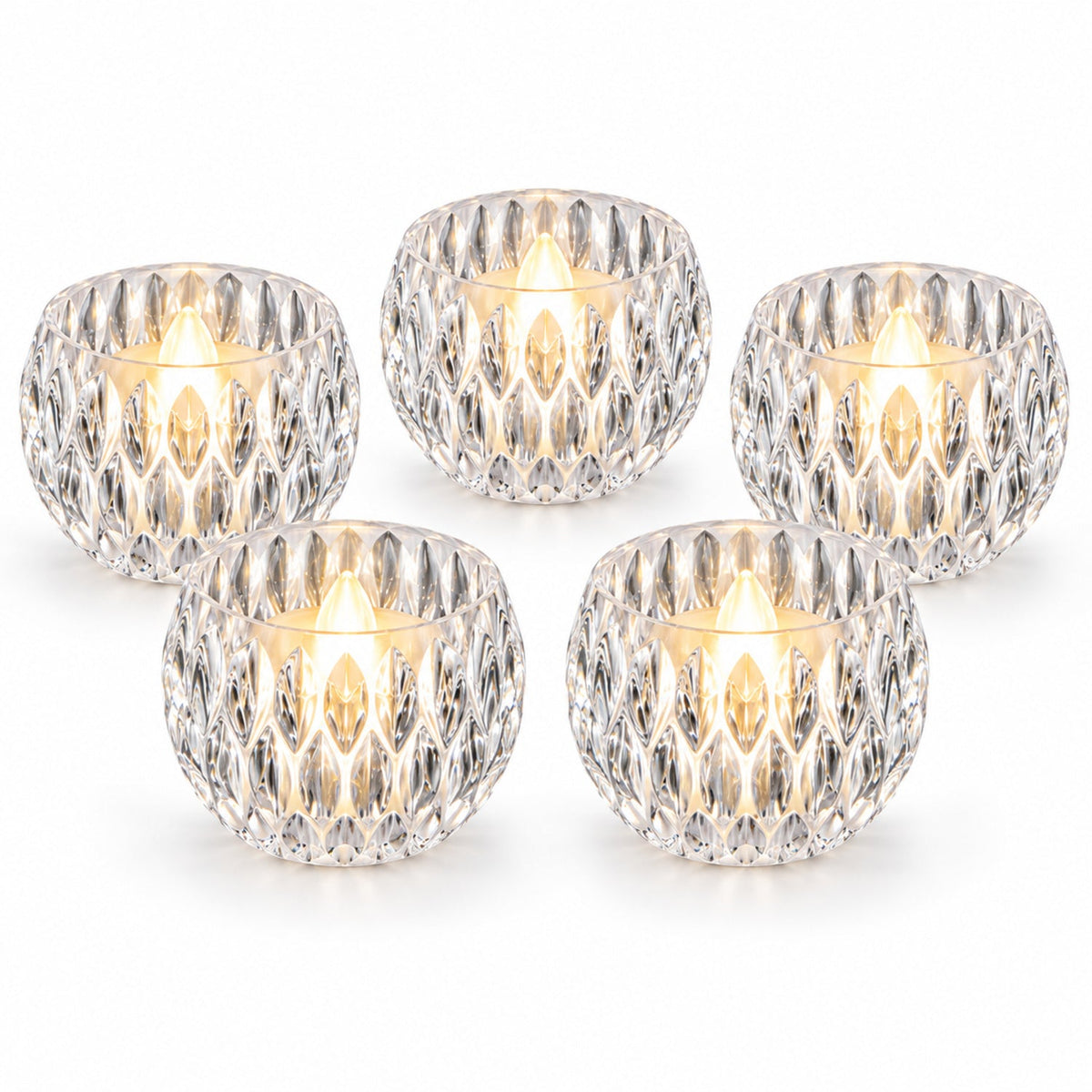 Five clear crystal LED tealights with faceted designs are arranged on a clean white background.