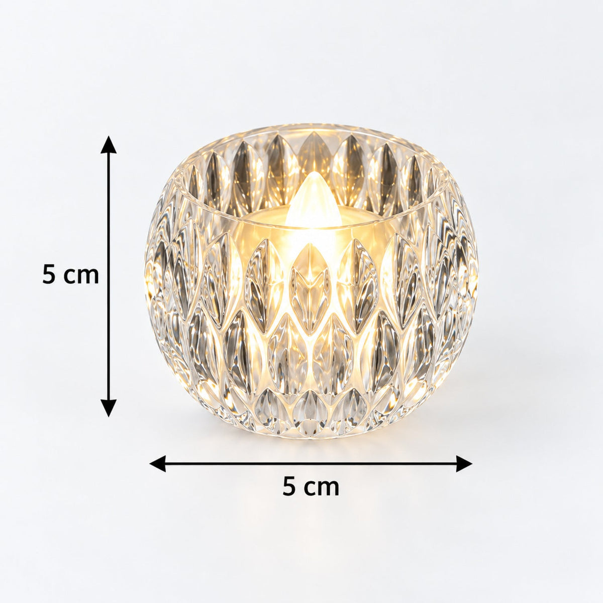 A single clear crystal LED tealight with a glowing flame, showing its 5 cm height and width dimensions.
