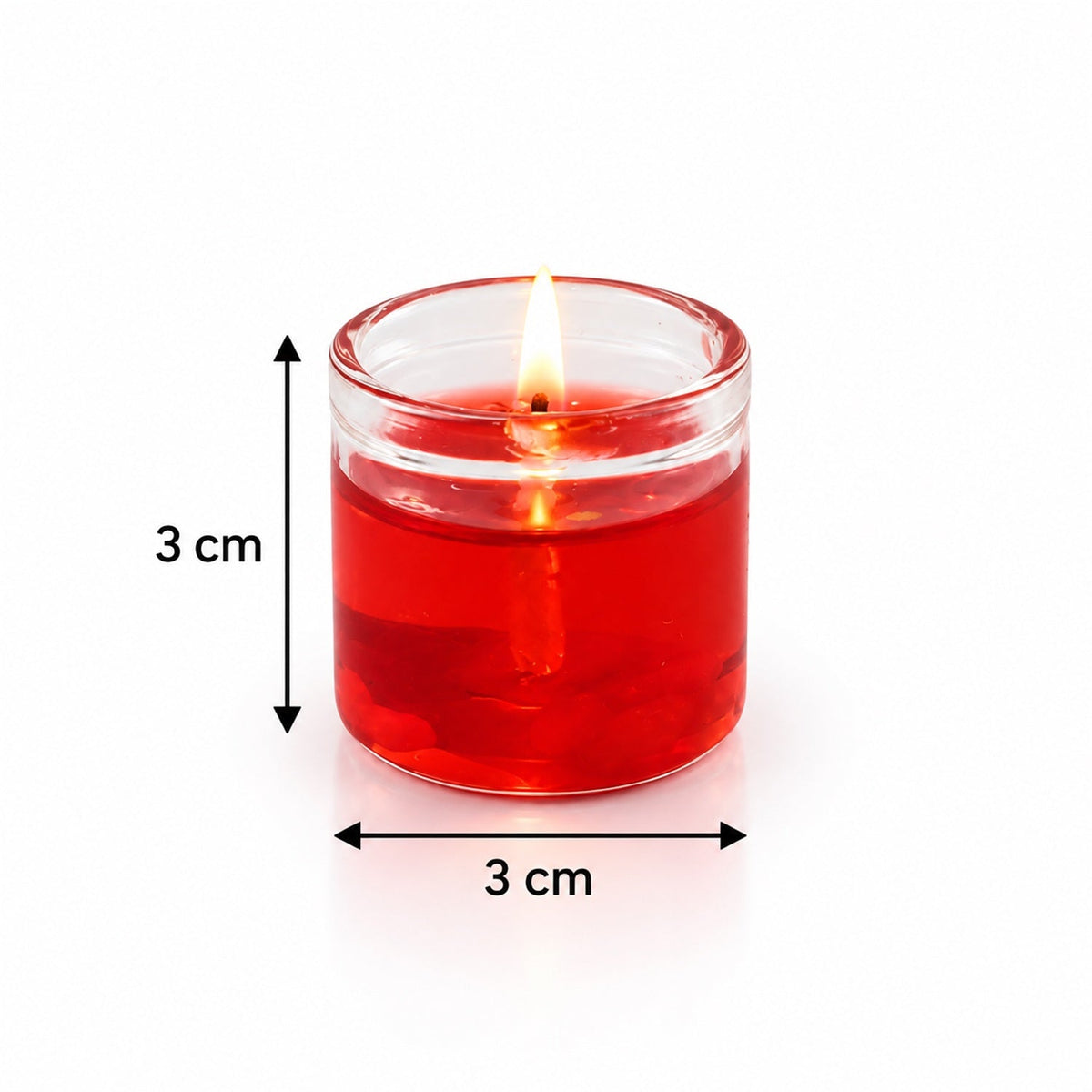 A single lit red gel candle in a clear glass jar is displayed with