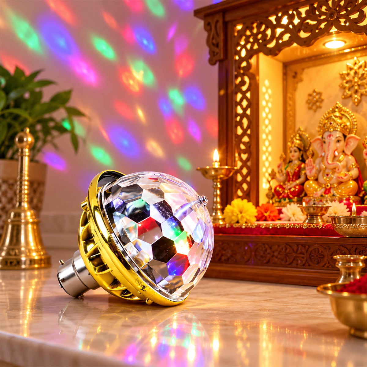 A gold and clear disco bulb rests on a glossy surface, projecting colorful lights onto a wall with a wooden altar.