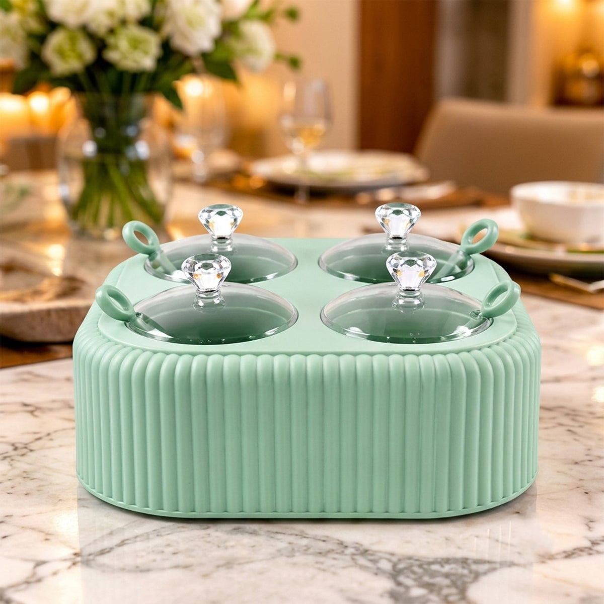 Mint green dining stand with four lidded jars on a marble table, set for a formal dinner.