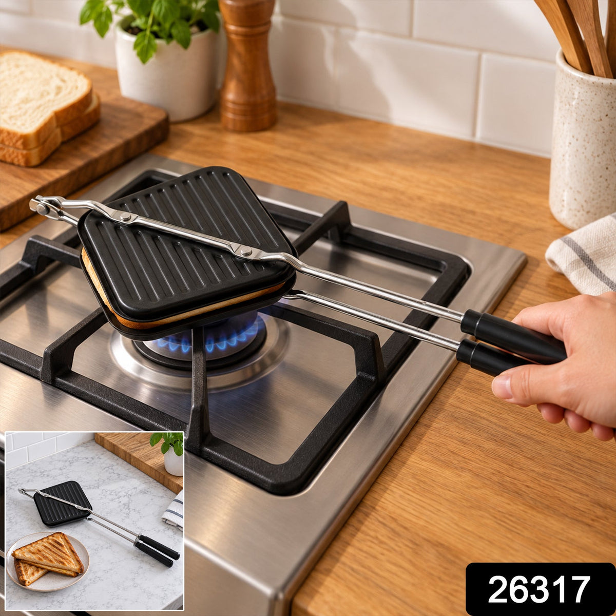 Hand holding the black sandwich maker over a lit gas burner, with bread slices and a plant in the background.