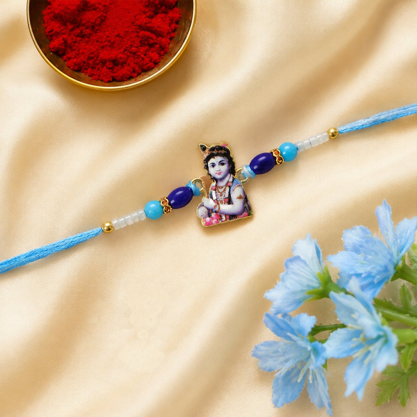 Blue Beads Rakhi with traditional design and soft thread