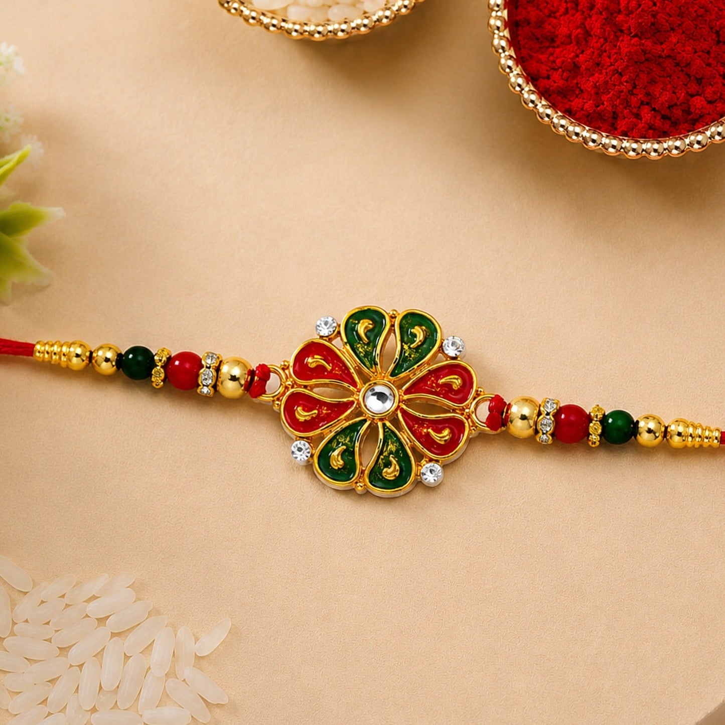 Vibrant Flower Rakhi for Brother with colorful enamel petals and shining golden beads.