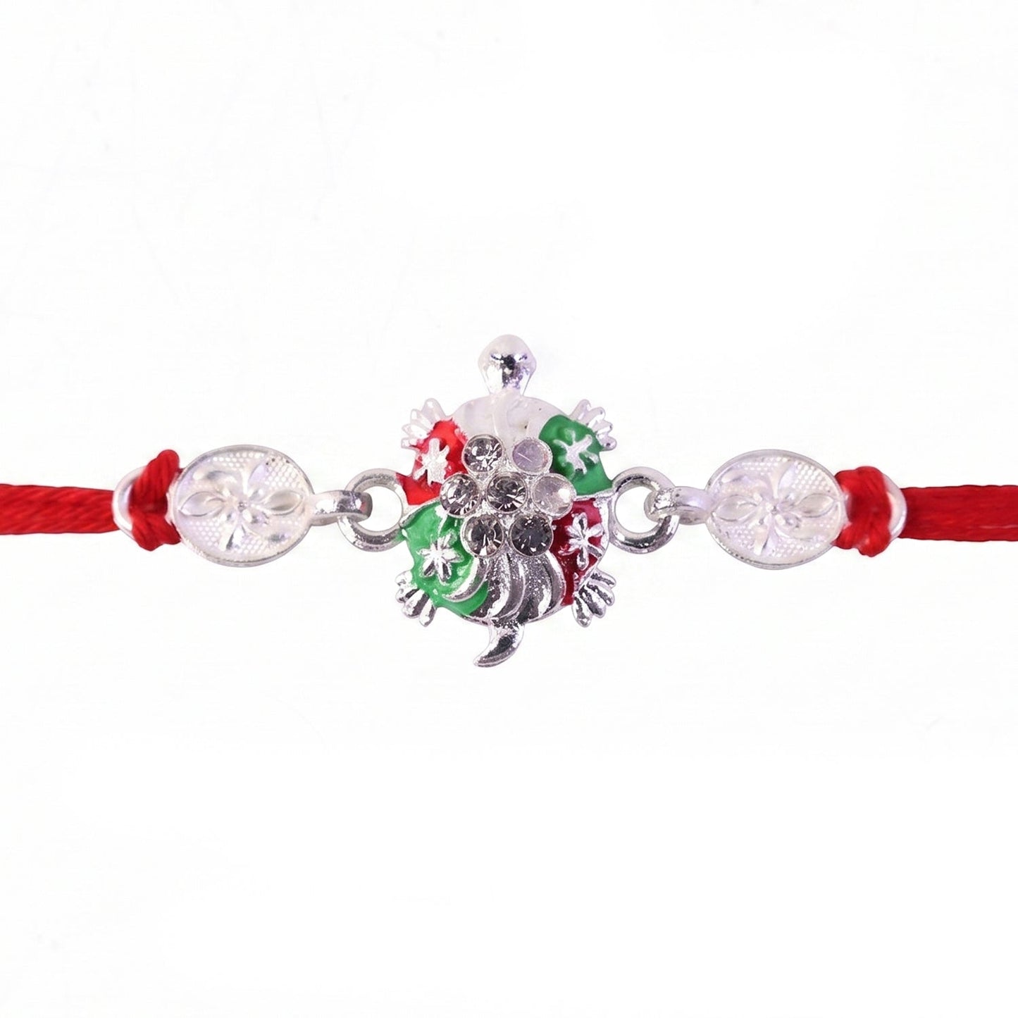Traditional Turtle Rakhi with red thread and decorative elements.
