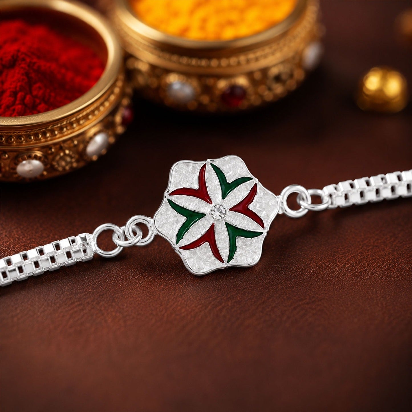 Silver Chain Rakhi with elegant flower design for Rakshabandhan celebration