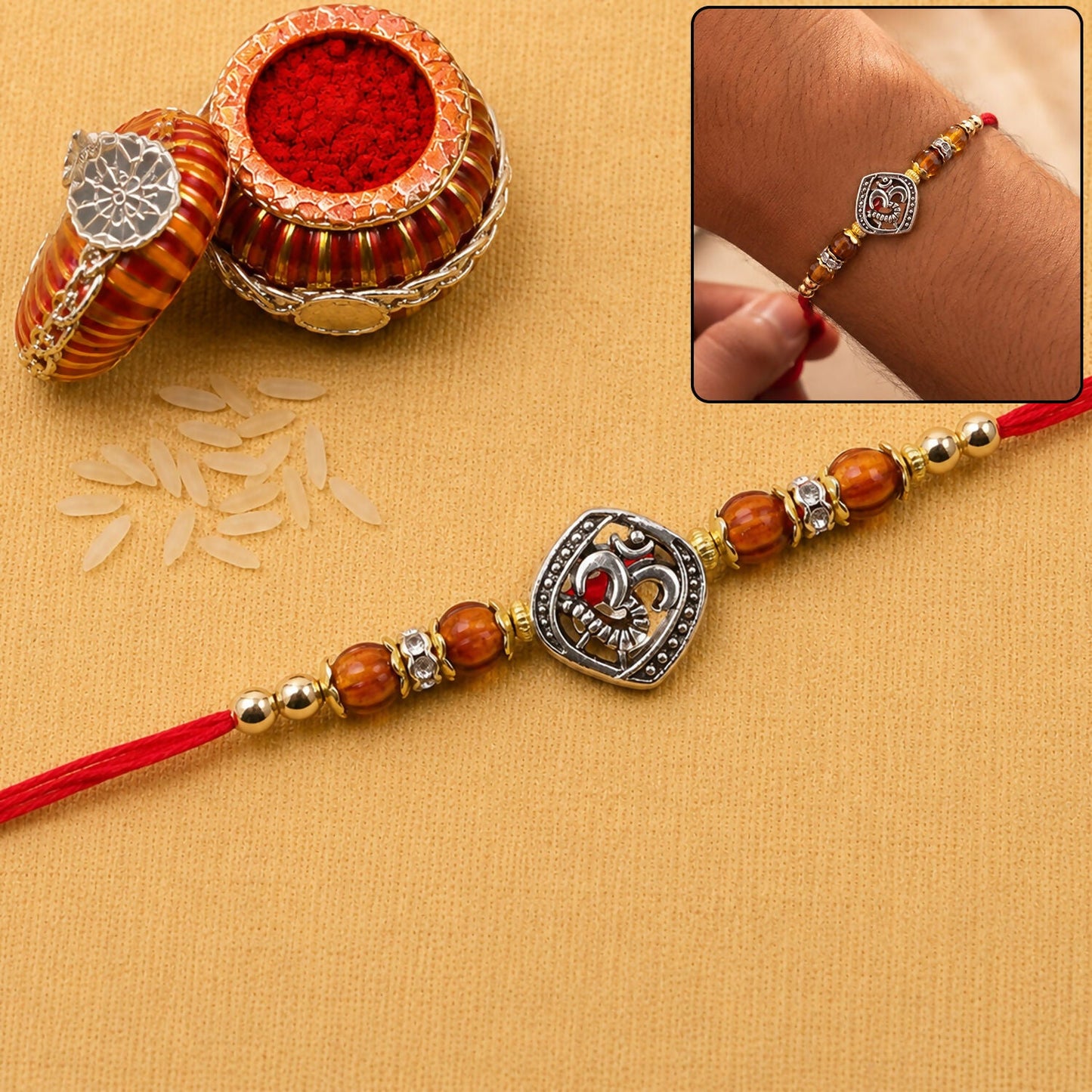 Close-up of the spiritual Om Rakhi with beads, ready for Rakshabandhan.