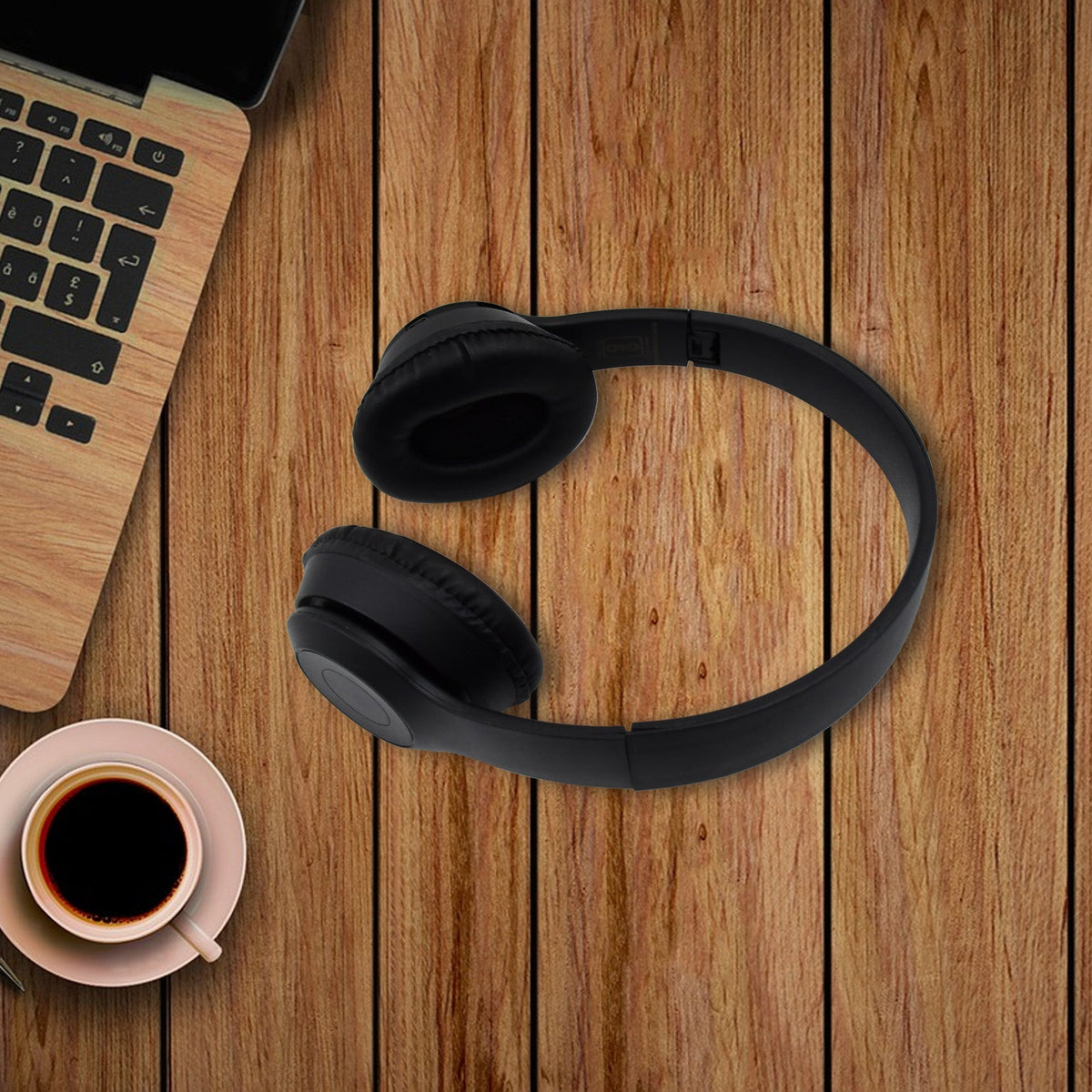 Close-up of the adjustable headband and soft ear cushions of the over-ear headset.