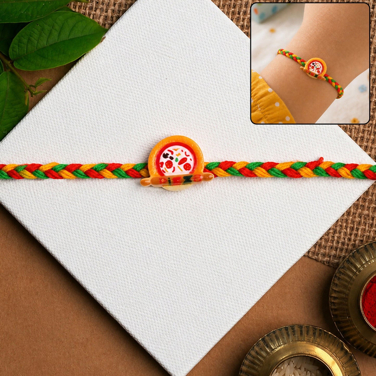 Kids rakhi with colorful thread and pizza charm - front view
