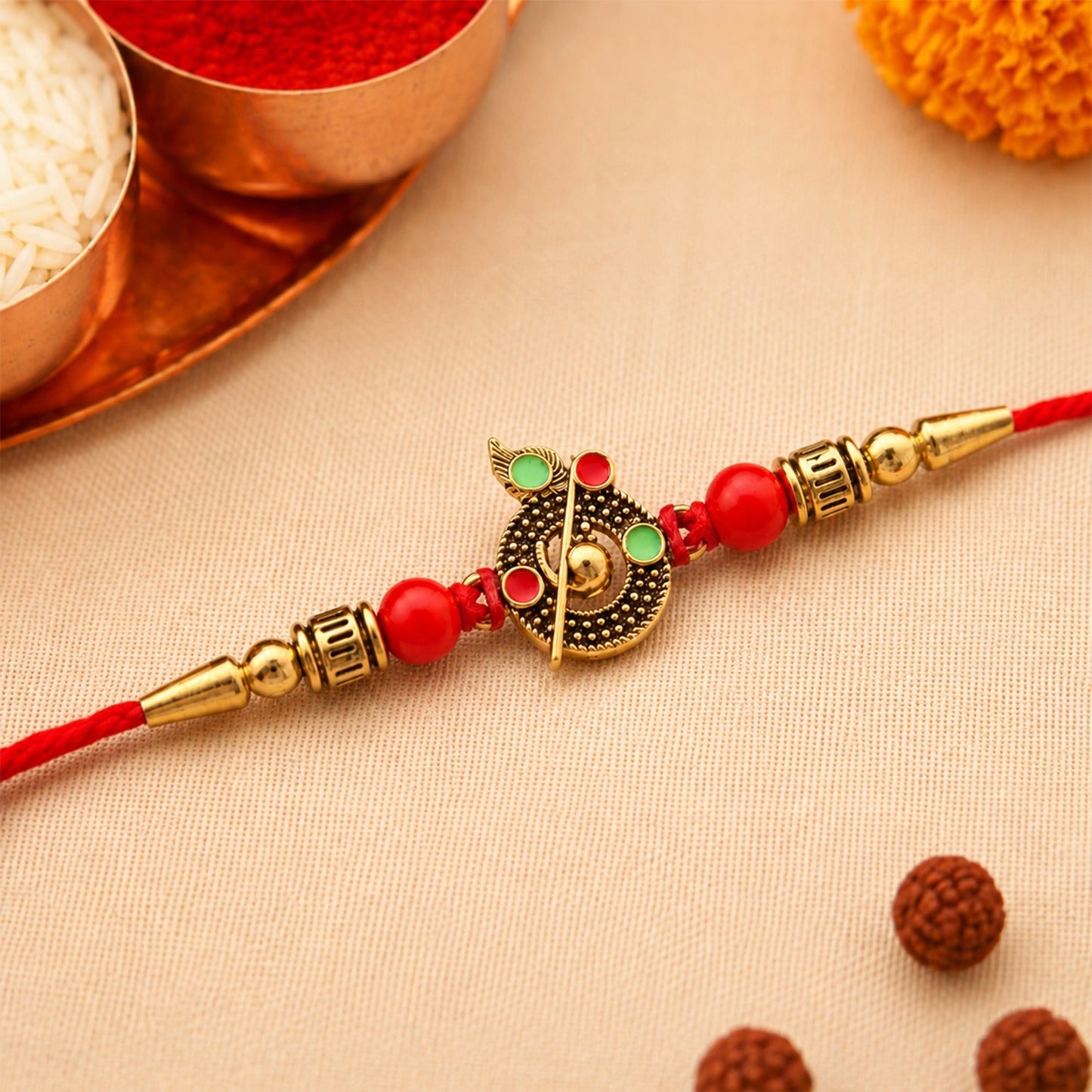 Red beaded Krishna Rakhi tied gently on brother's wrist symbolizing love and protection.