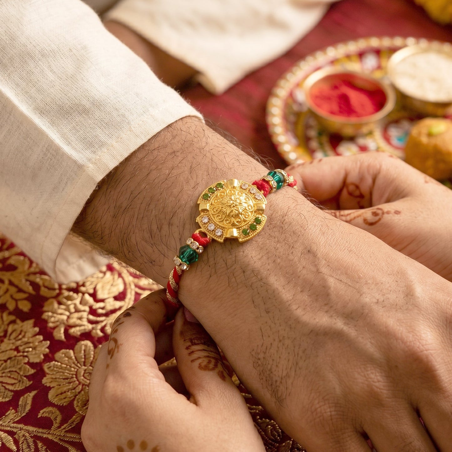 Thread work and decorative elements of the festive Rakhi.