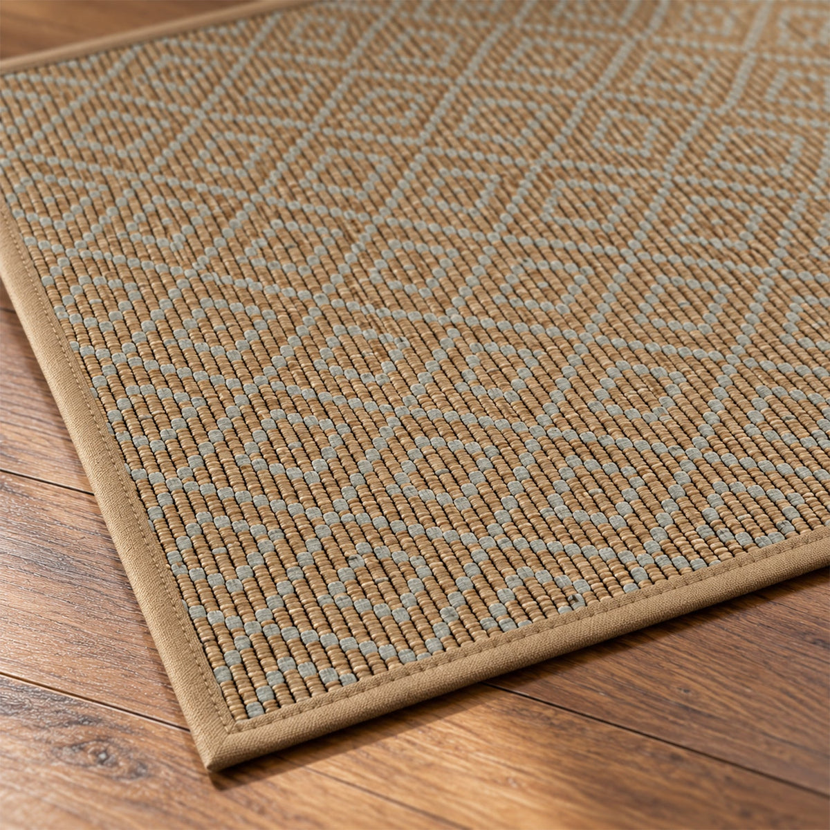A close-up shows the intricate brown and grey diamond weave texture of the runner mat with a thin border.