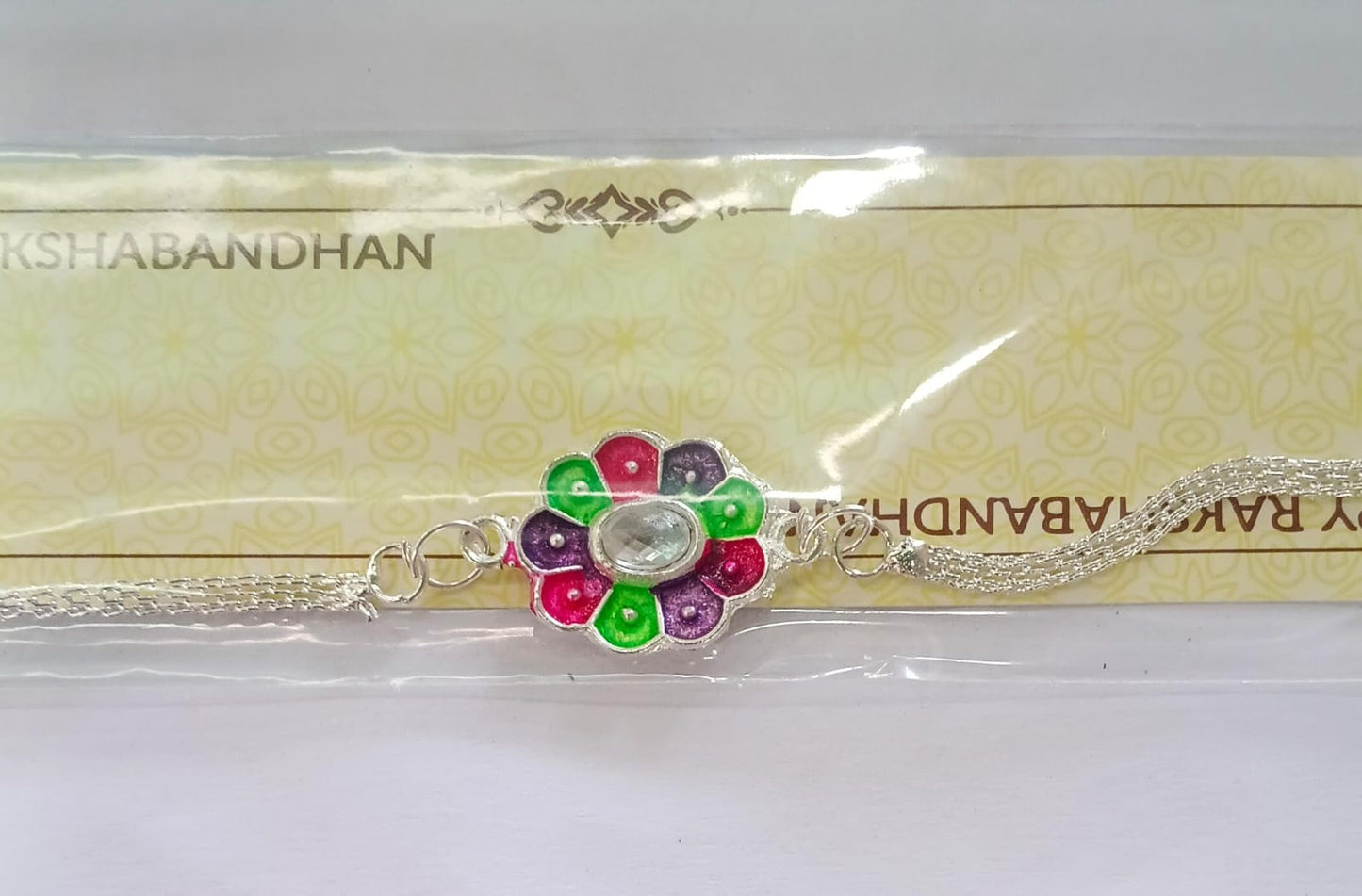 Collection of colorful flower design Rakhi bracelets, perfect for festive gifting.
