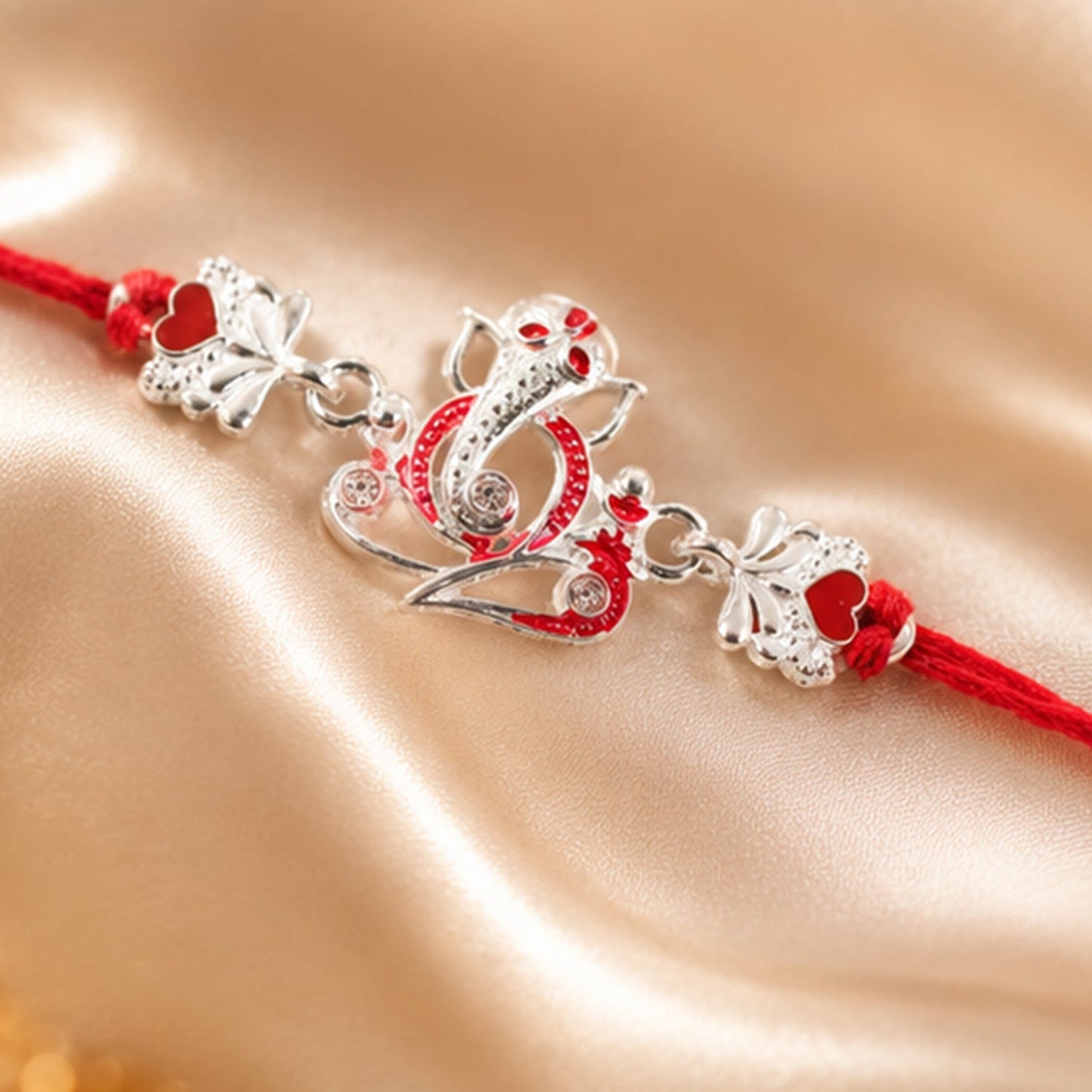 Hand tying the traditional velvet-look rakhi for brother, showcasing its comfort.