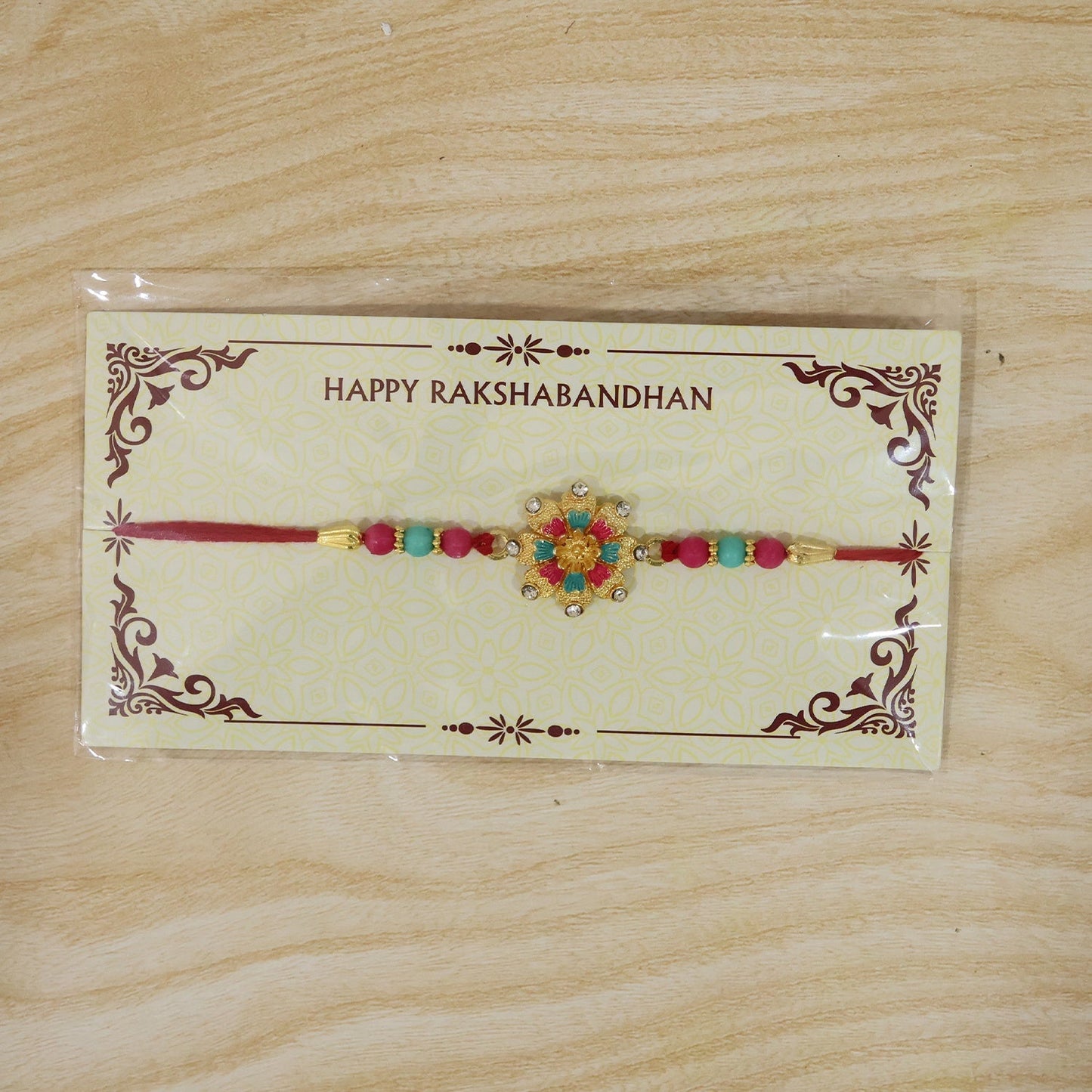 Detailed view of intricate floral mandala Rakhi design