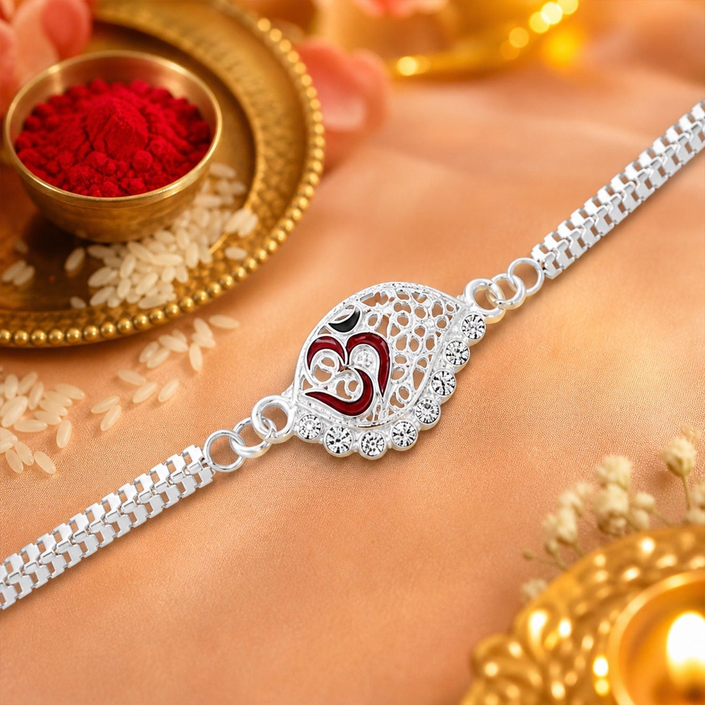 Silver plated Rakhi featuring Om symbol and dual chain design on festive background