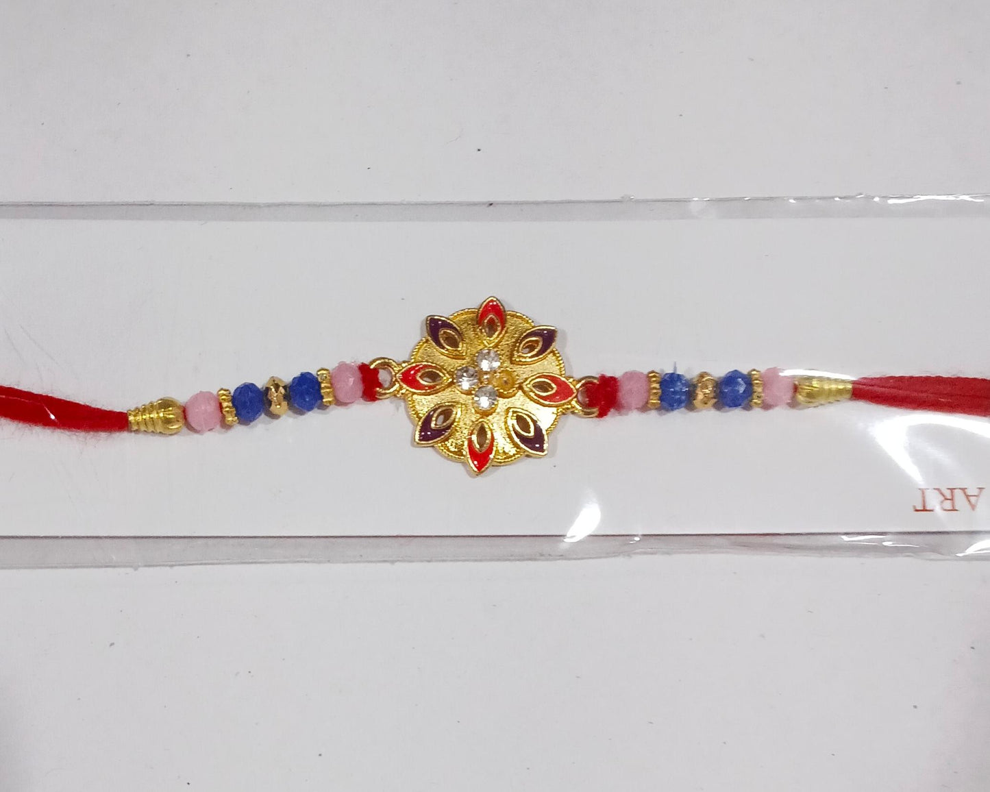 Assorted floral Rakhis with beads and colorful threads