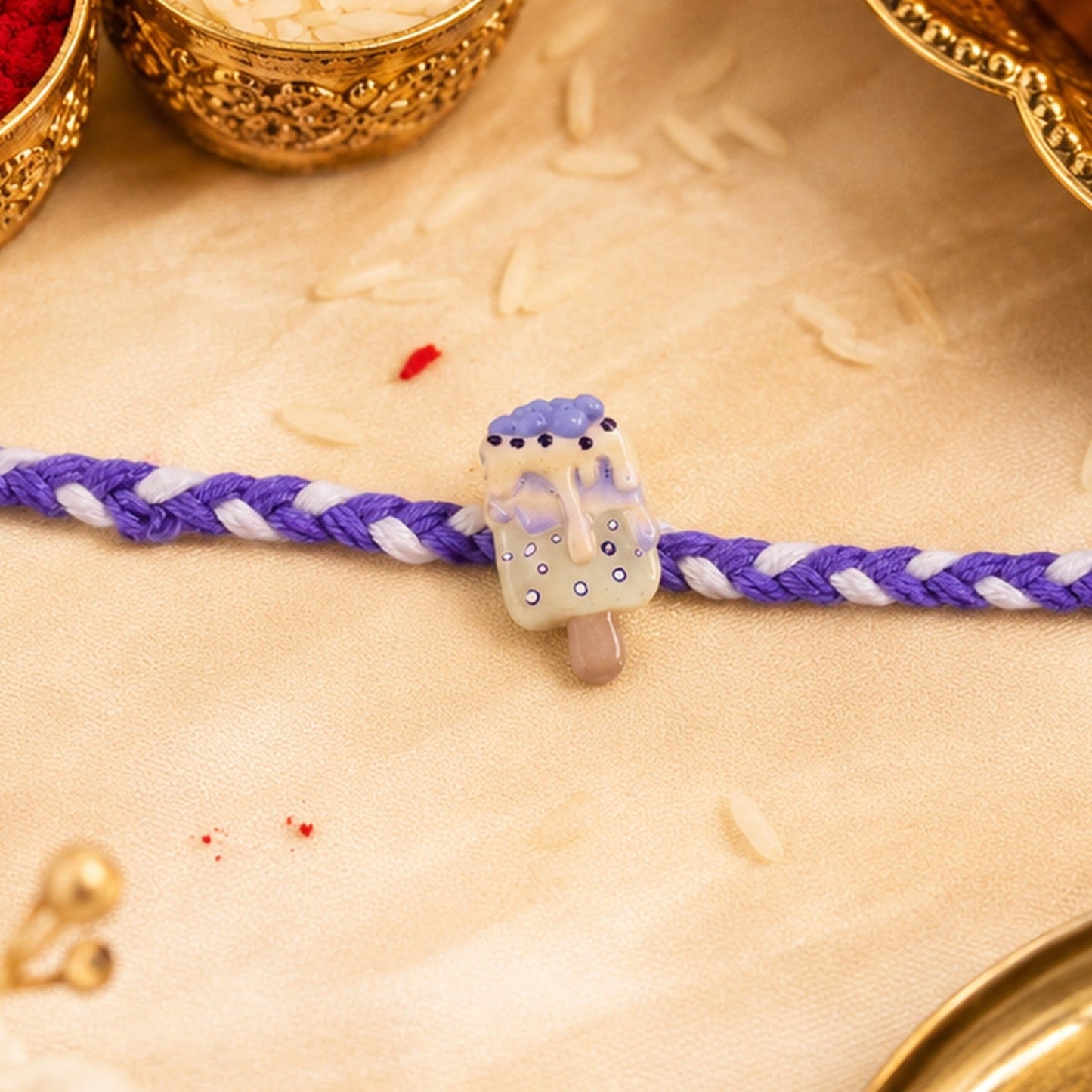 Vibrant Ice Cream Fancy Dori Rakhi with colorful threads for Raksha Bandhan.