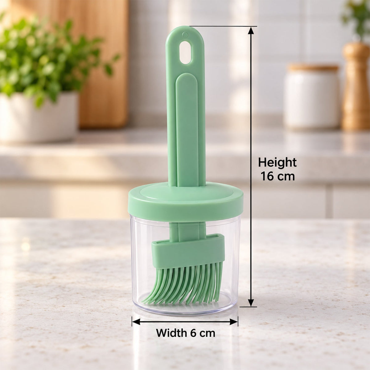 A green silicone brush stored inside a clear container with a green lid, displaying height and width measurements against a