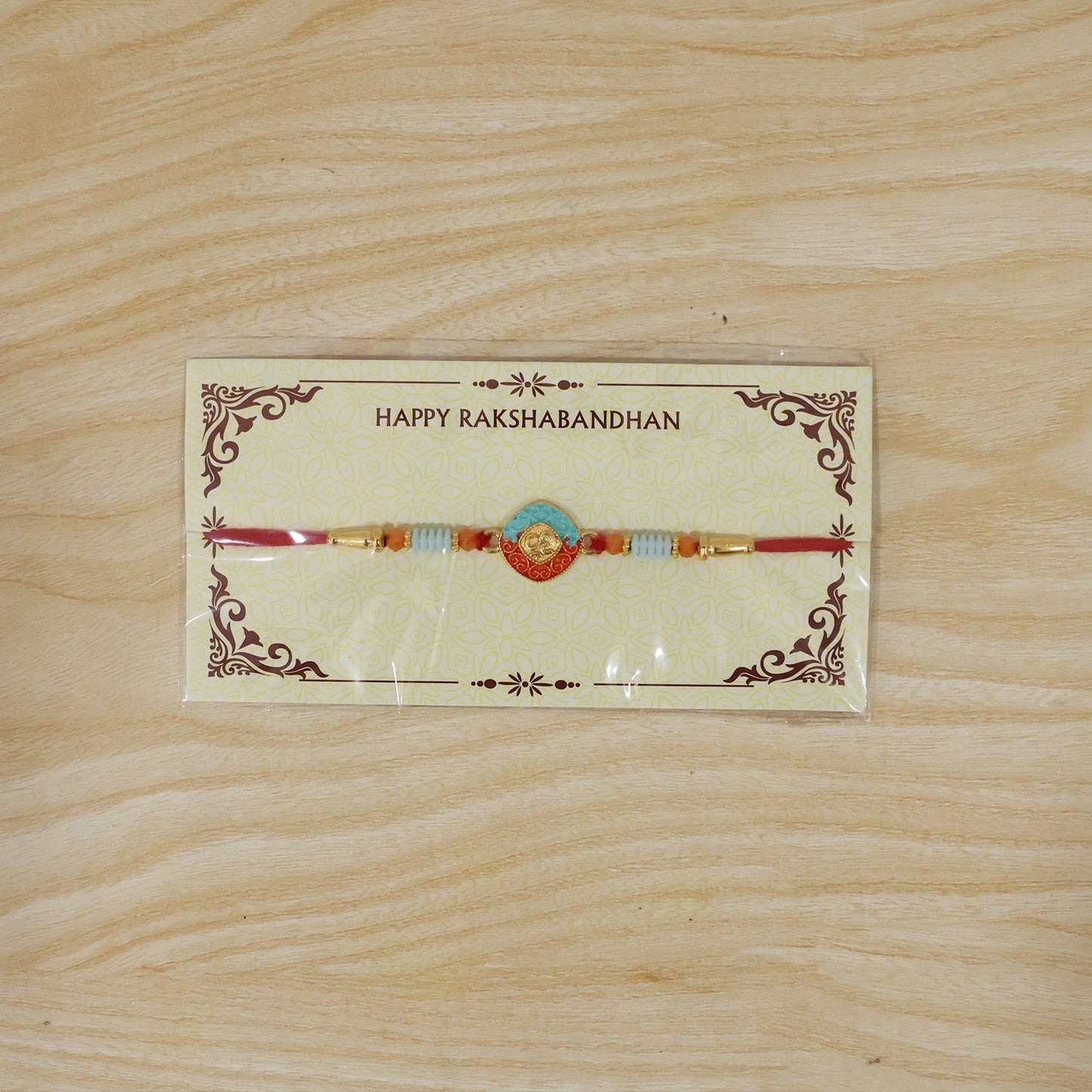 Festive charm of OM symbol Rakhi