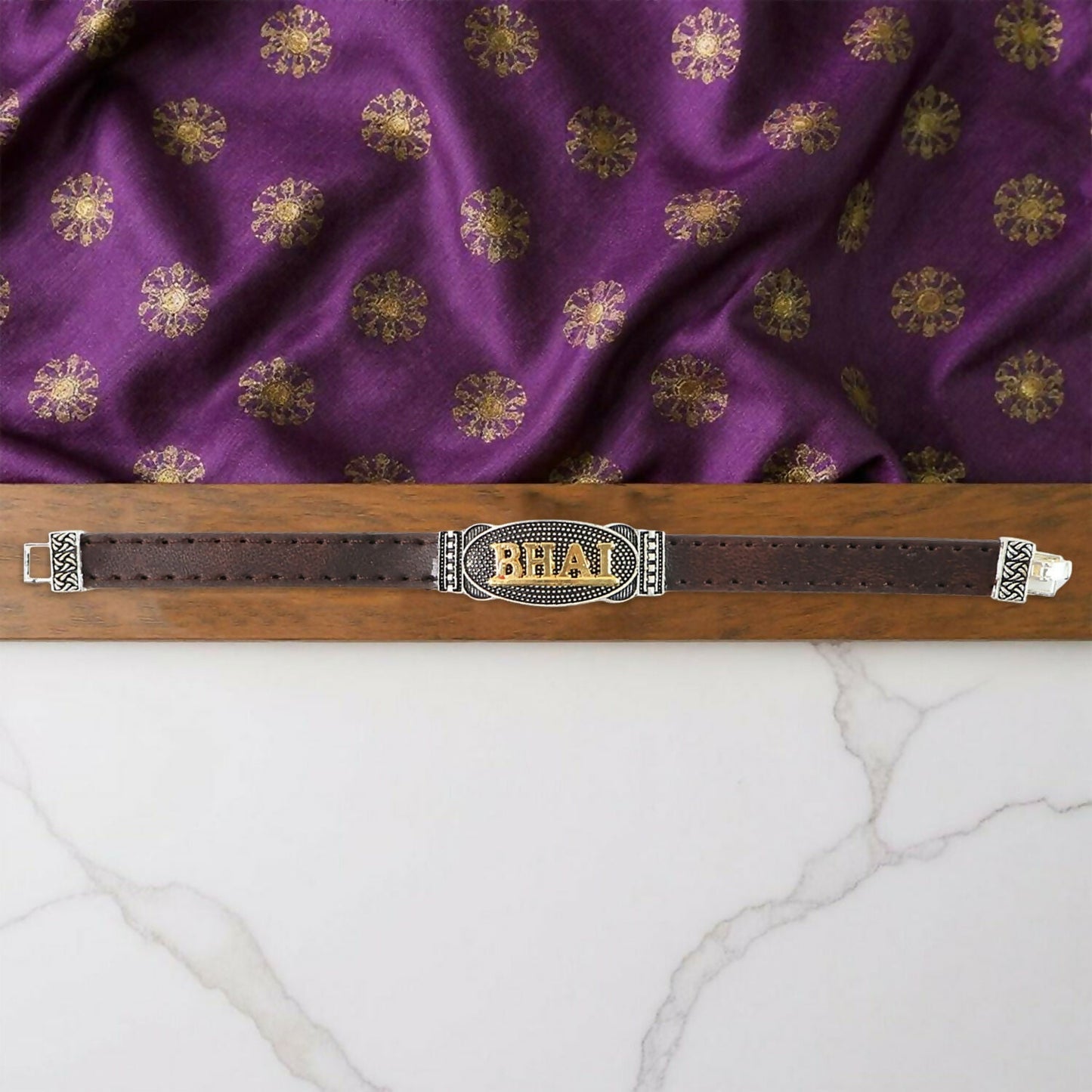 Hand holding a surprise bracelet rakhi for brother showcasing festive charm