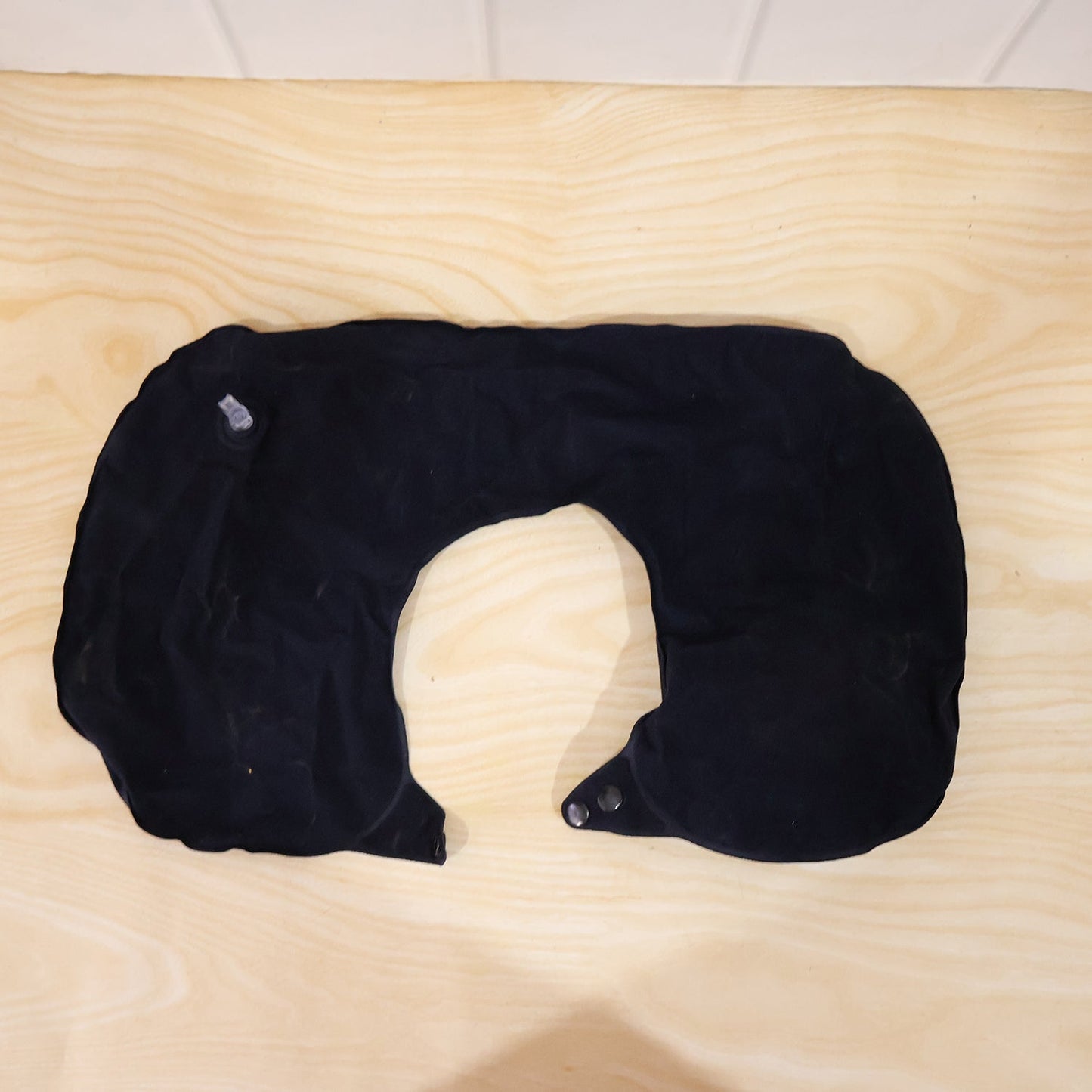 Portable inflatable pillow being used outdoors