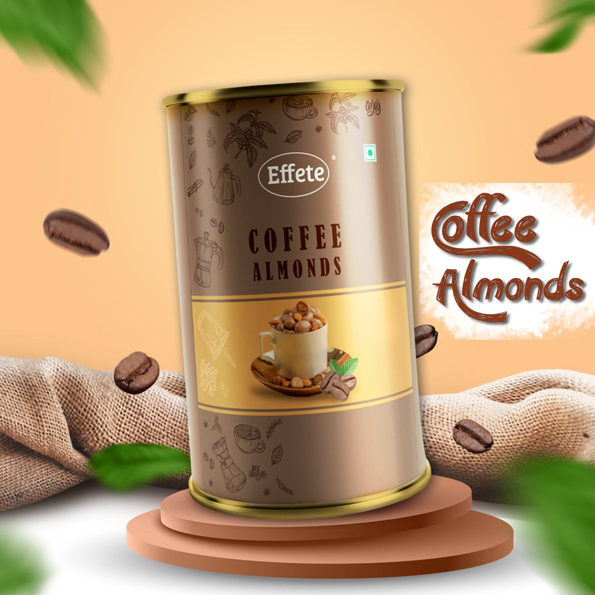 Brown and gold tin of coffee almonds on a brown pedestal with coffee beans and green leaves floating around.