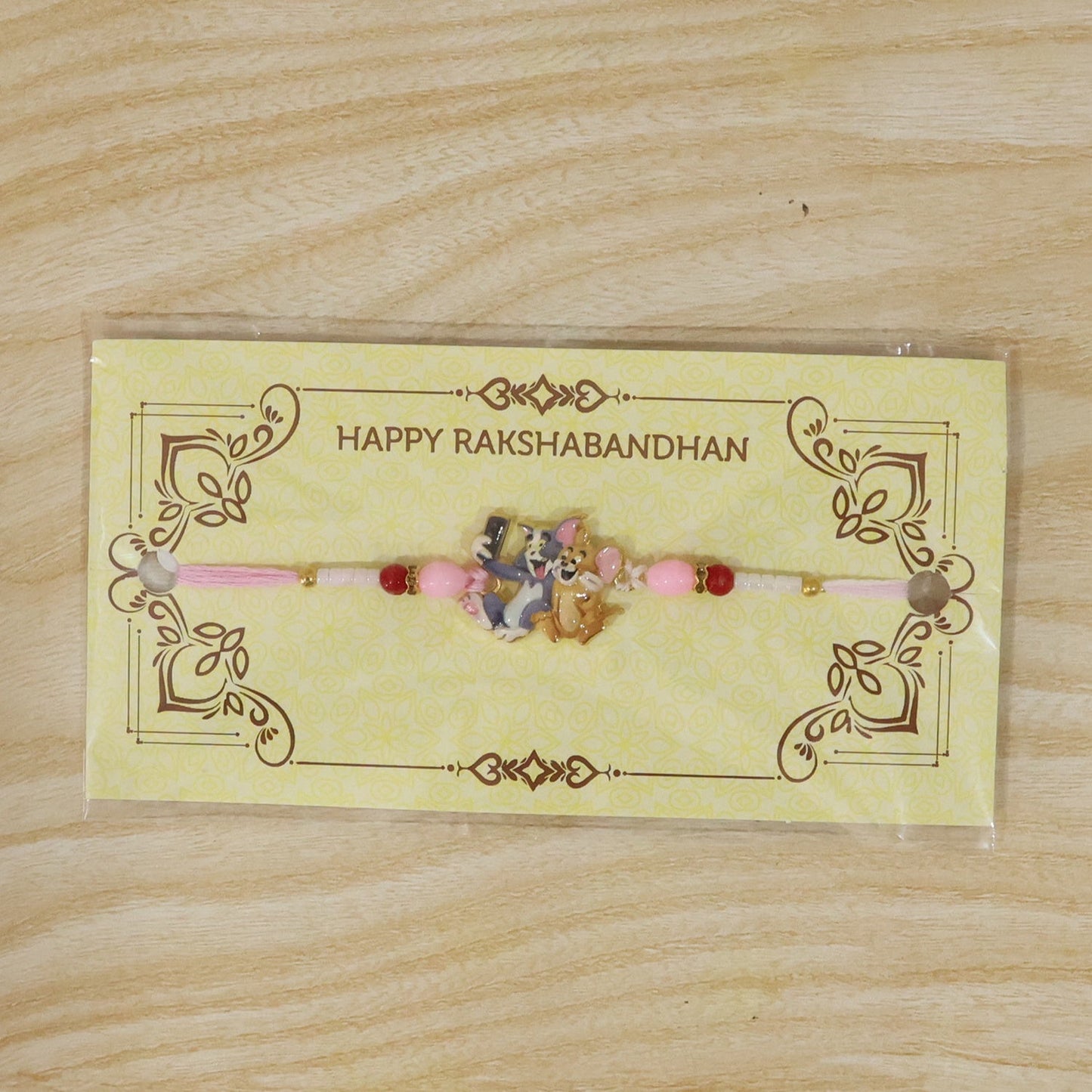 Festive Kids Rakhi with fun cartoon design and bright colors