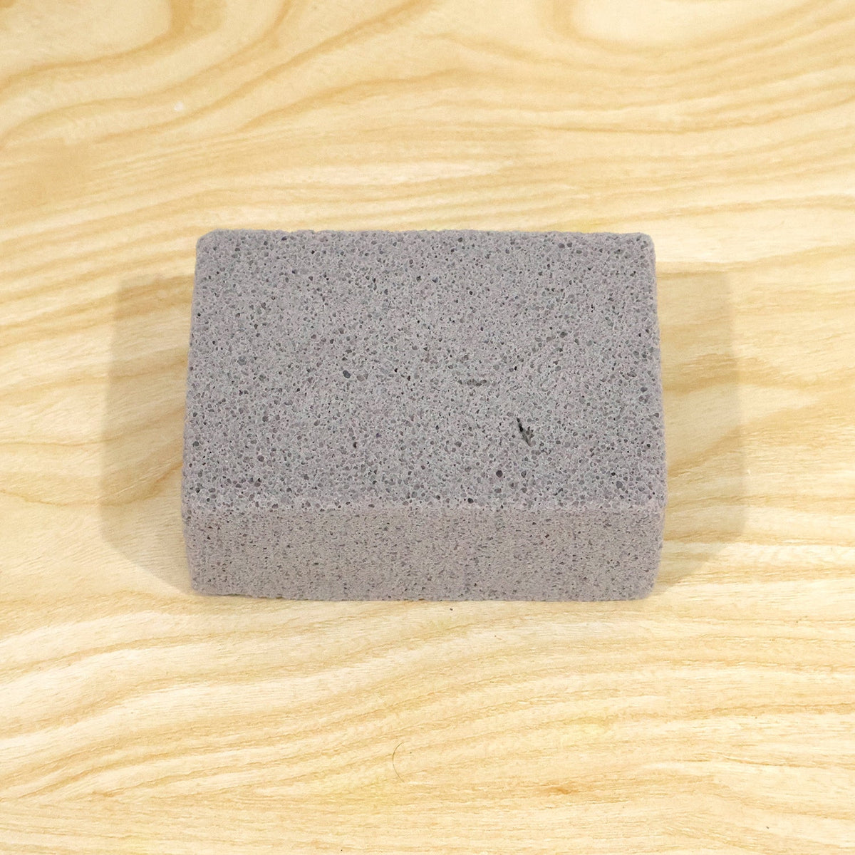Live photo of grill stone cleaning block