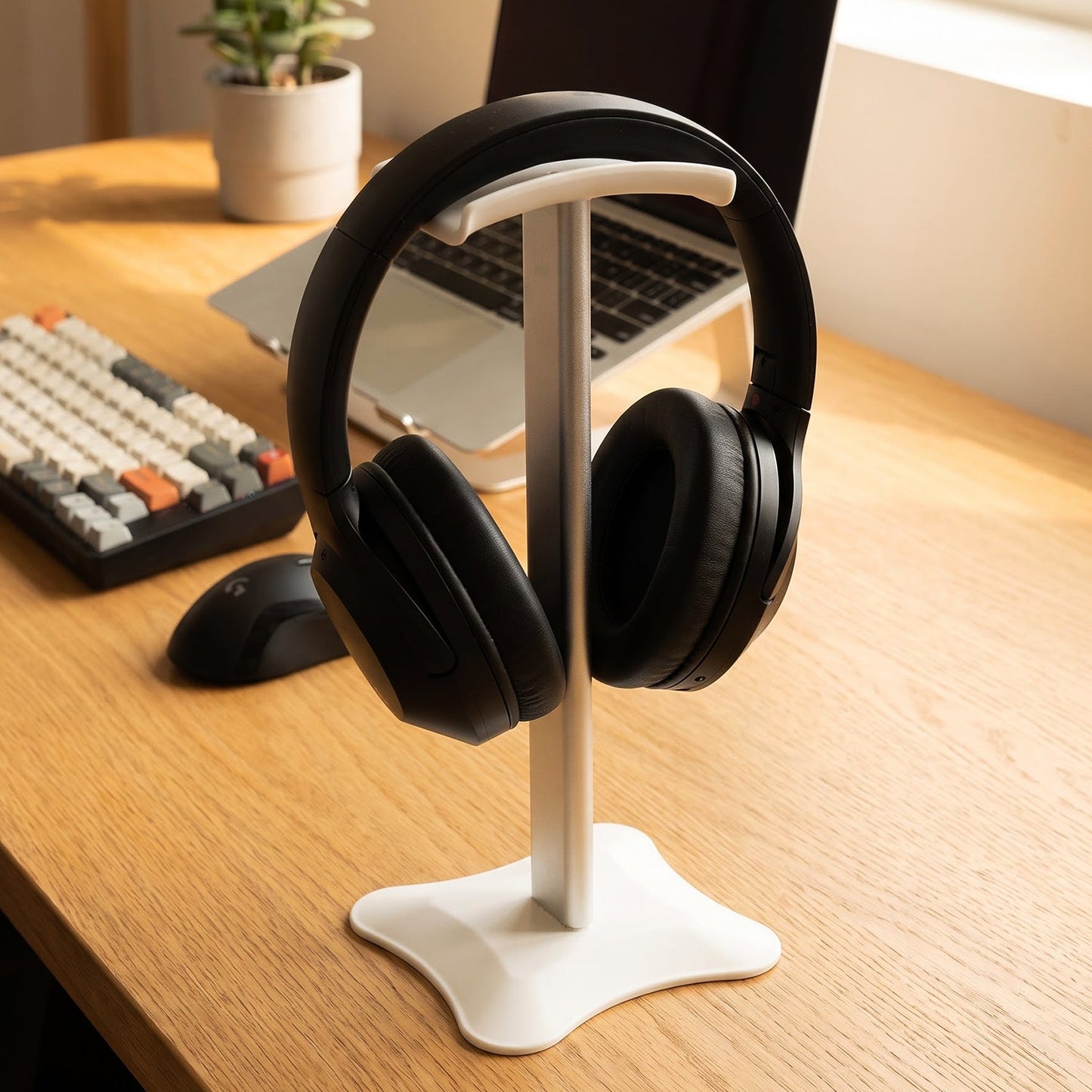 Headphones resting on the desktop stand