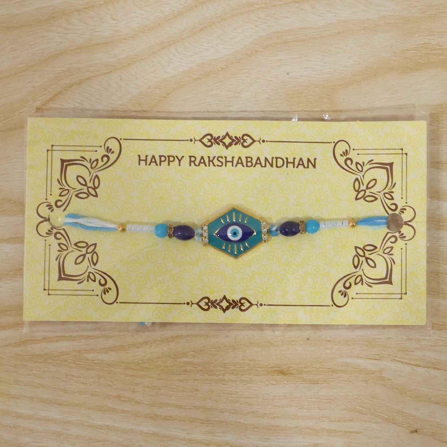 Evil Eye Hexagon Rakhi tied on brother's wrist