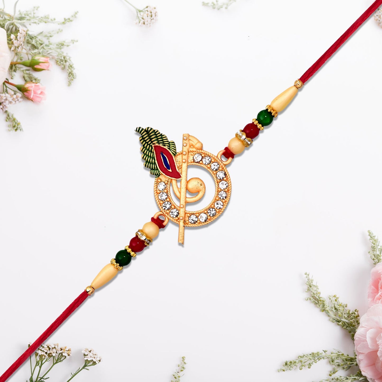 Decorative beads and Lord Krishna motif on Rakhi thread
