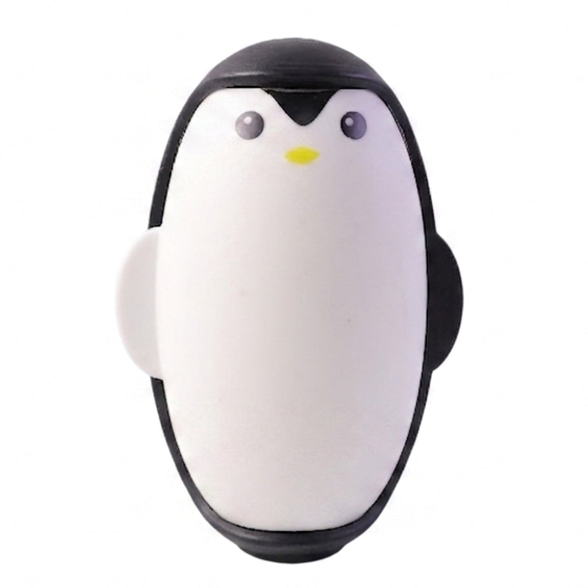 A black and white penguin lint roller with a yellow beak and gray eyes on a white background.