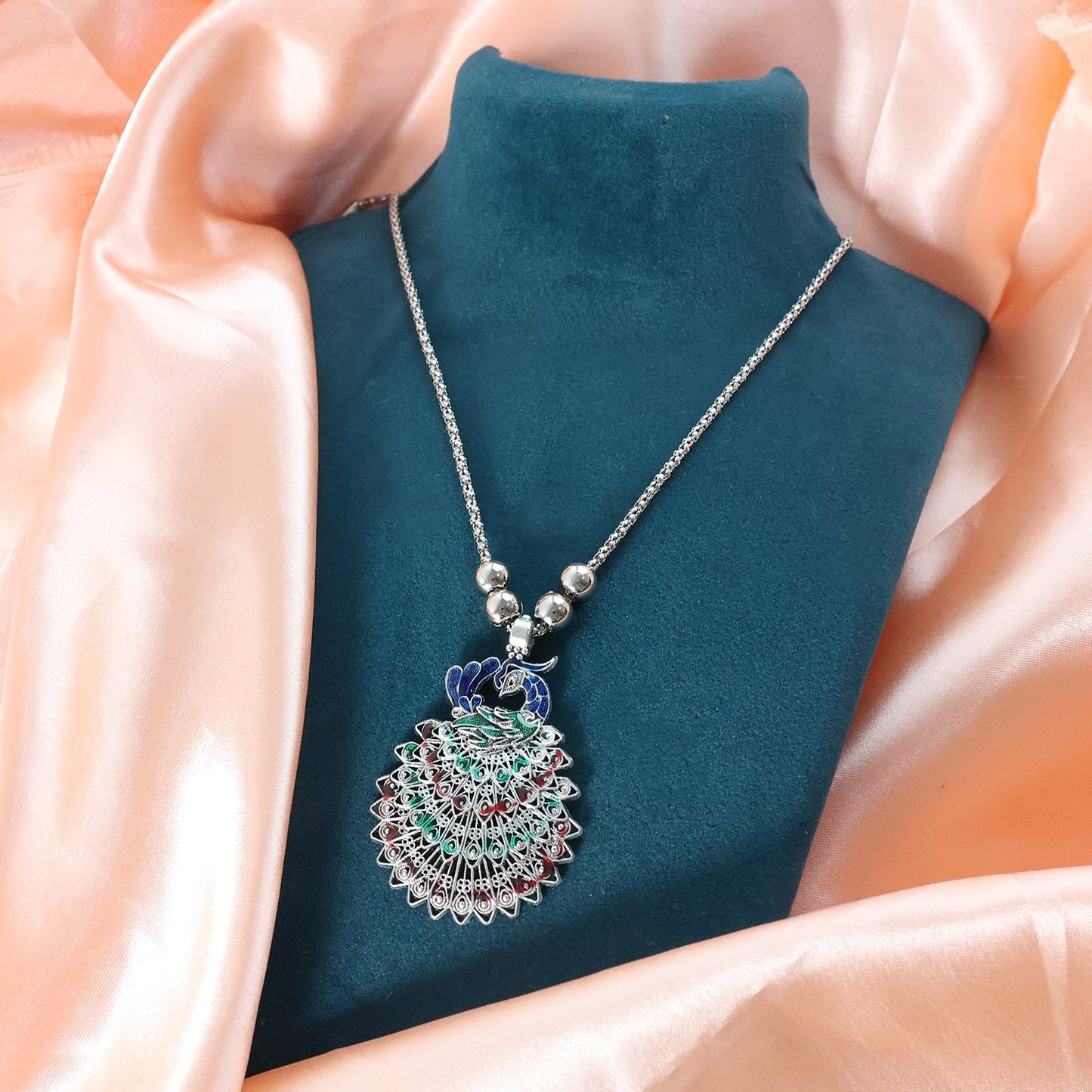 Peacock oxidized pendant