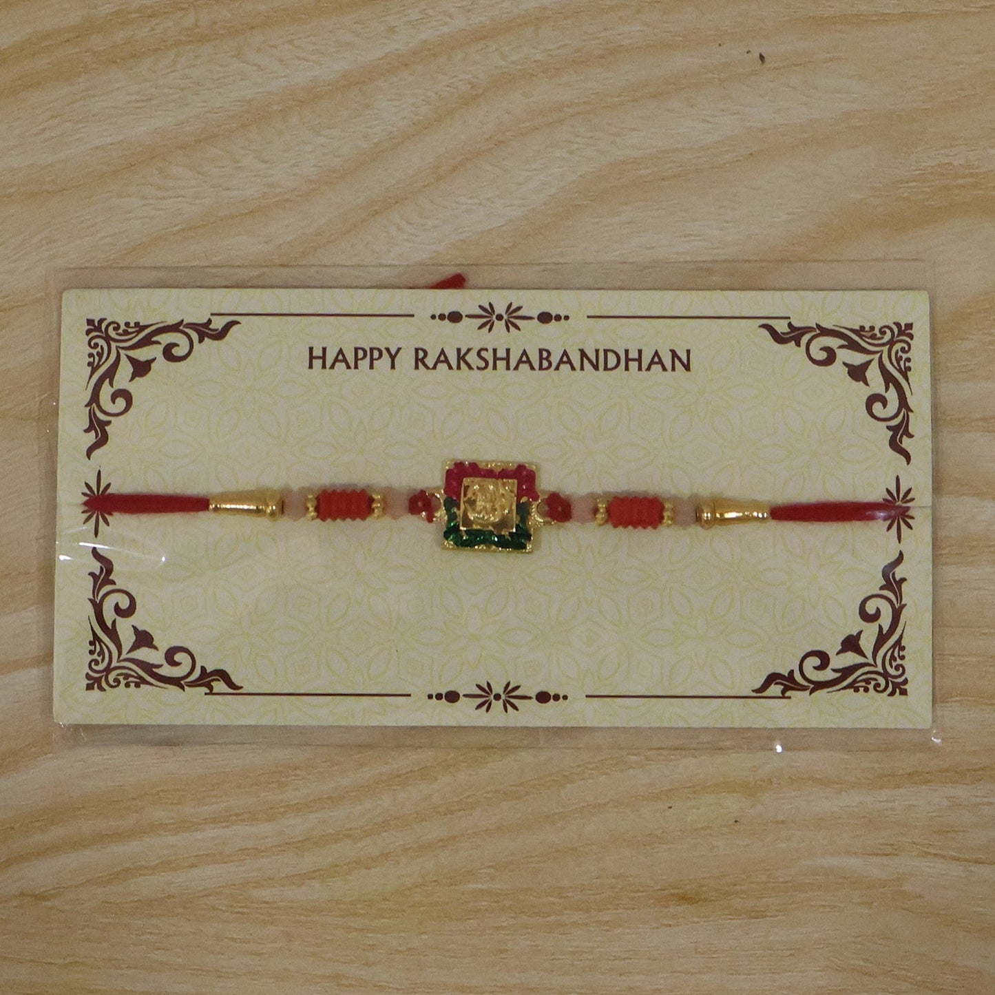 Close shot of decorative elements on Lord Ganesha rakhi