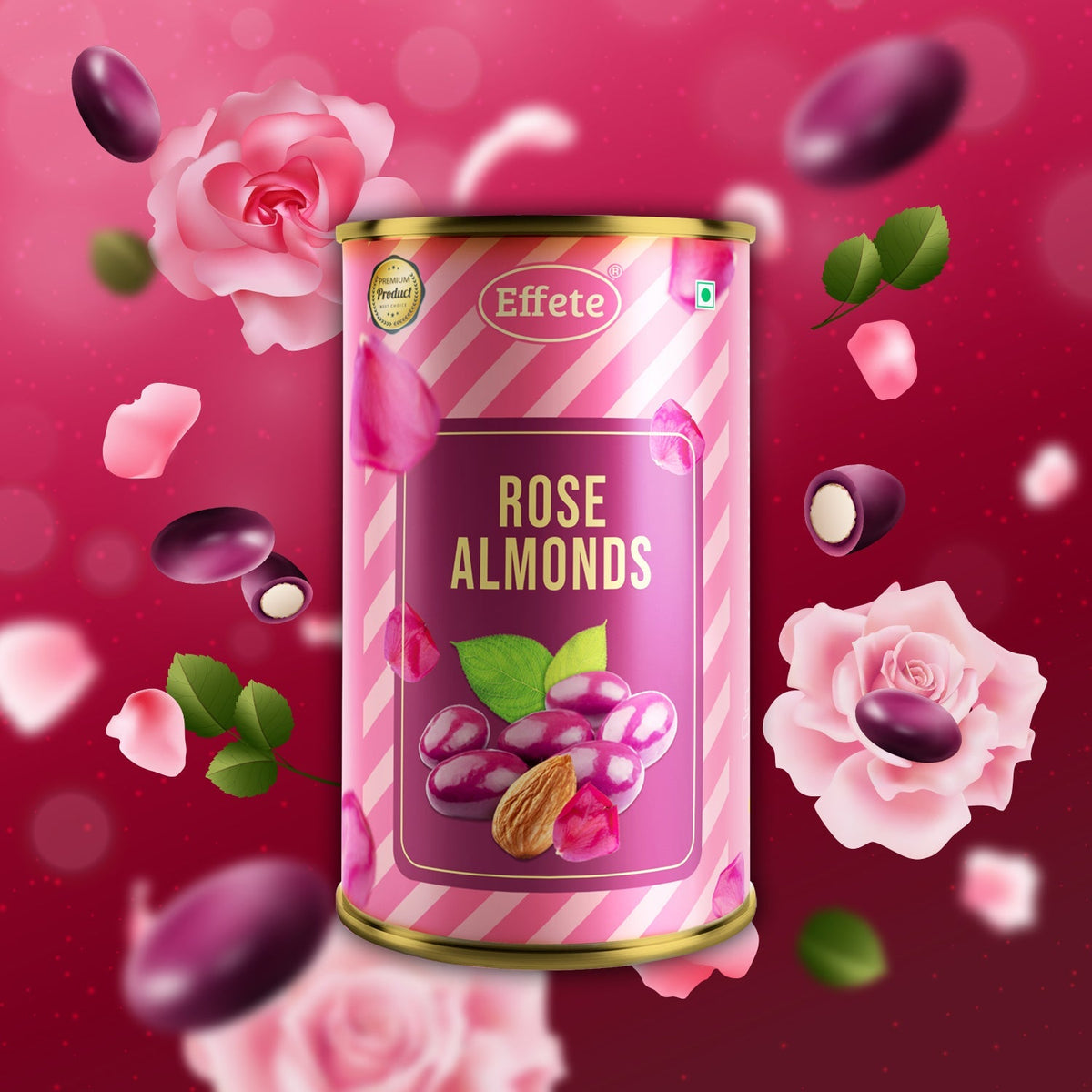 Pink and white striped tin of rose almonds with falling petals and whole roses, surrounded by dark chocolate pieces on a red