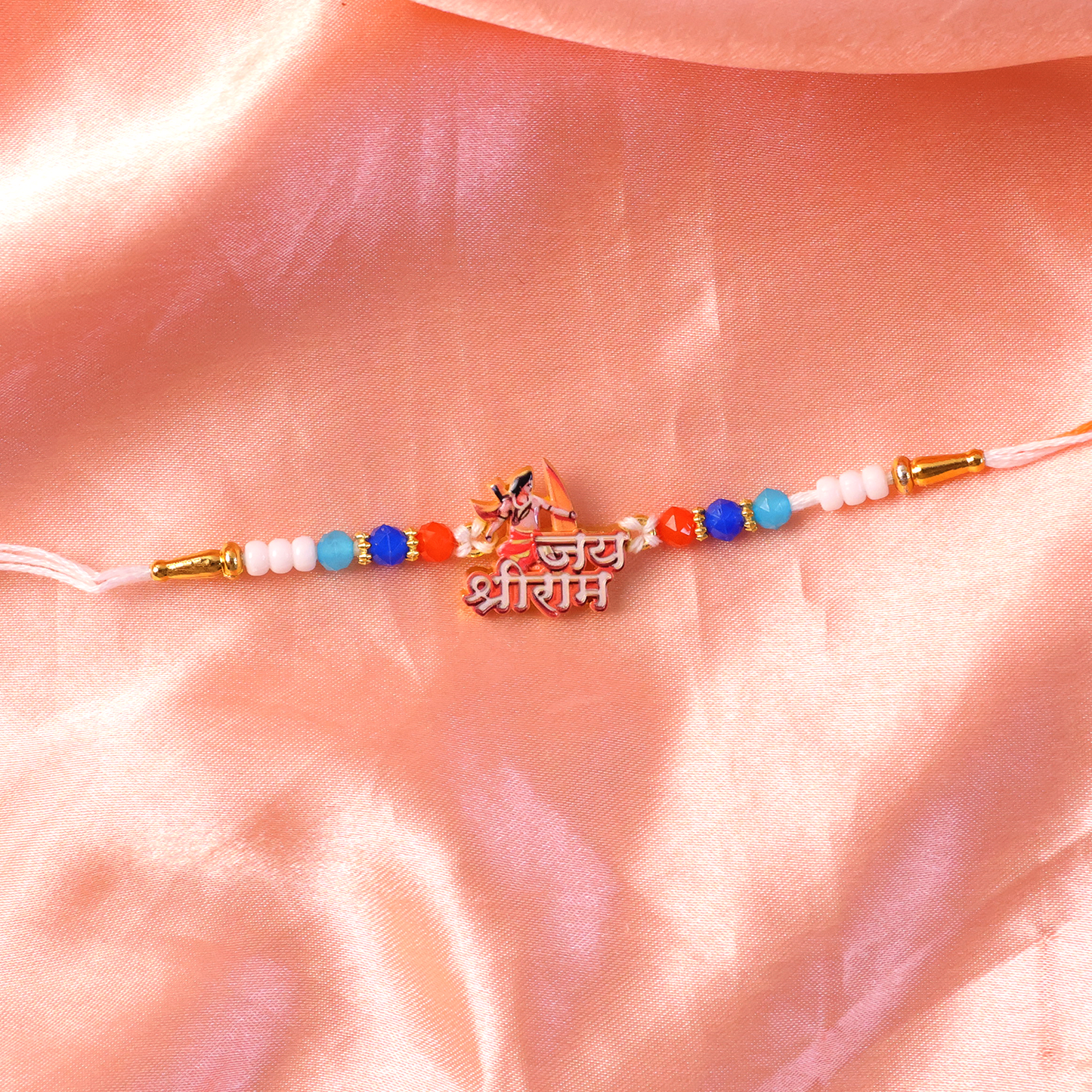 Traditional beads and thread detailing on Rakhi