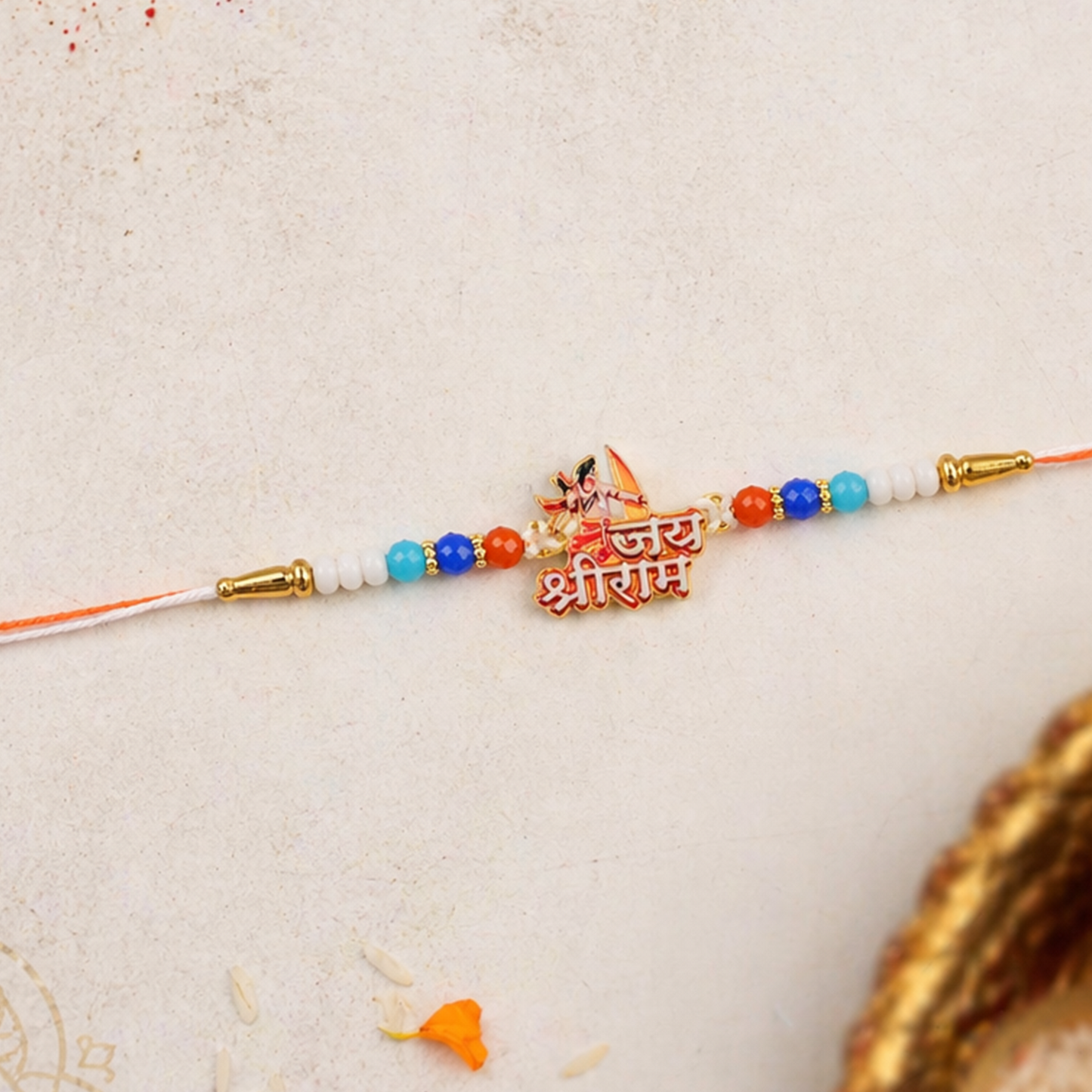Close-up of Jai Shri Ram inscription on designer rakhi