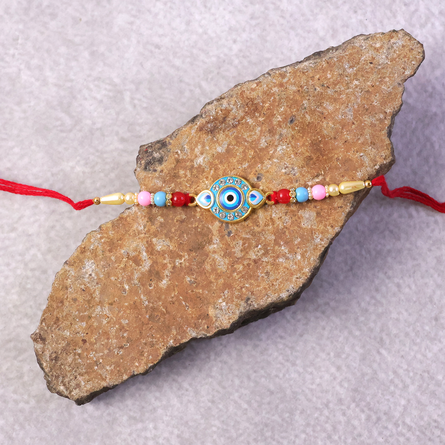 Evil Eye Rakhi with bead detailing and festive look