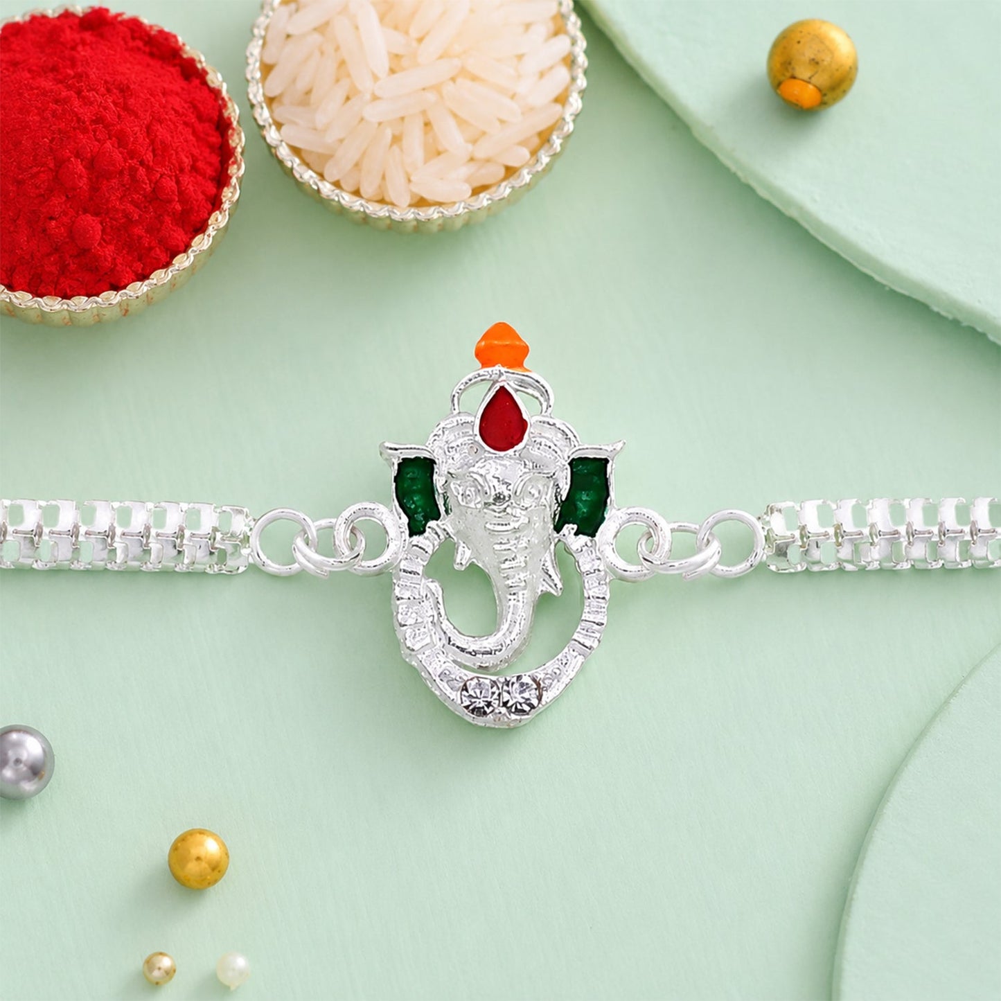 Ganesha Rakhi – Stylish Enamel & Silver Chain for Brothers