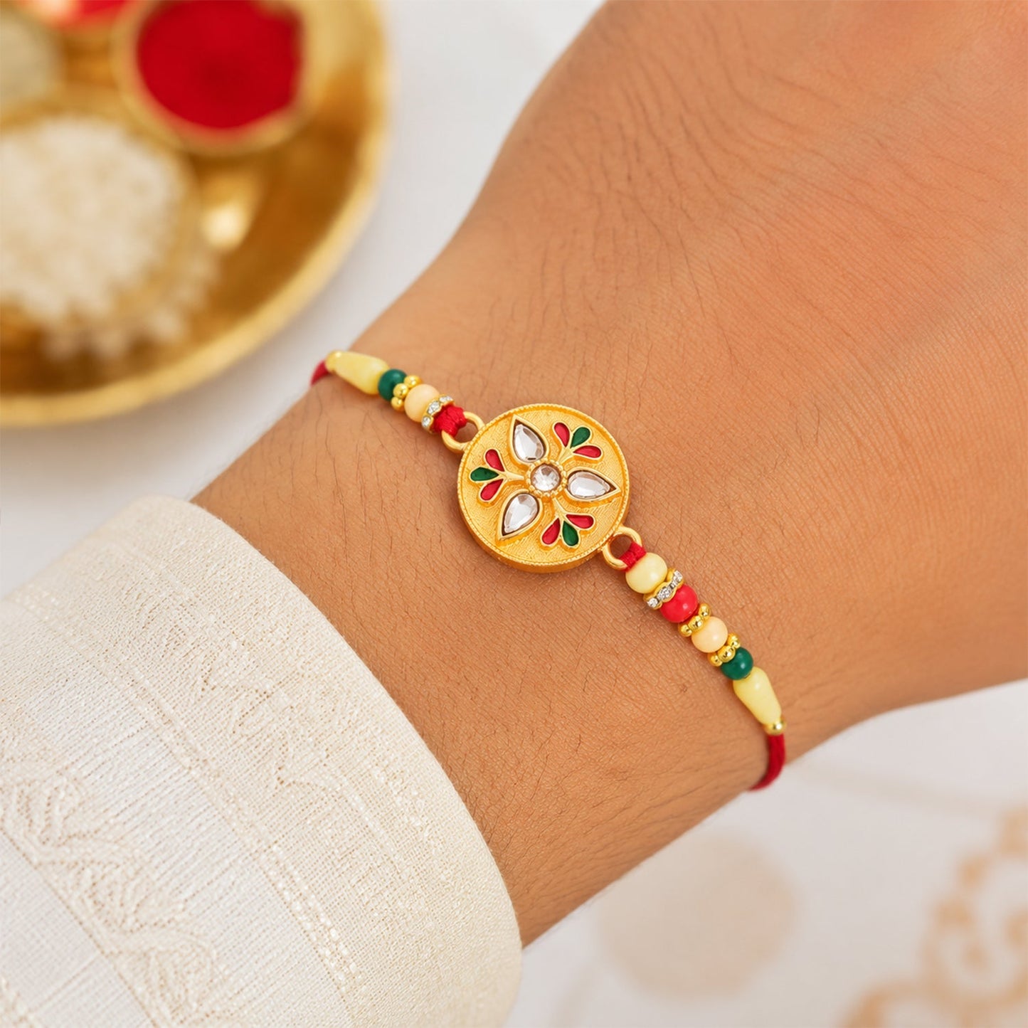 Elegant Kalash Rakhi displayed with traditional festive elements for Raksha Bandhan.
