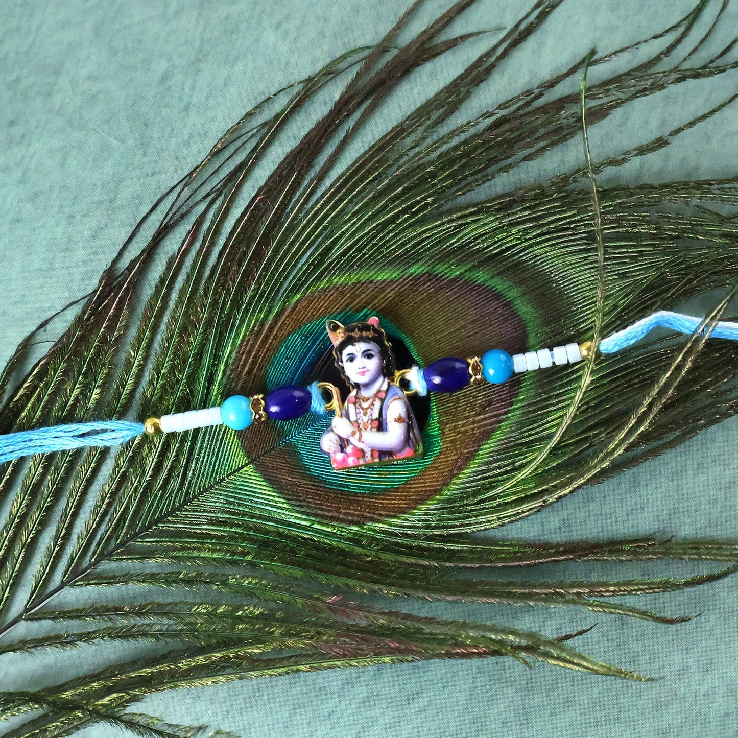 Decorative Blue Beads Rakhi for festive occasion