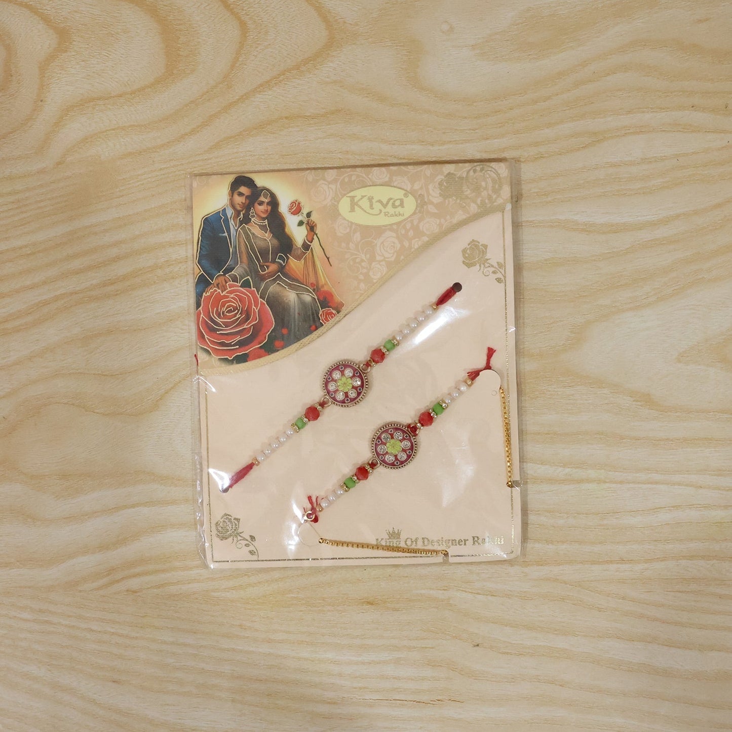 Live display of designer pearl Rakhi with floral stones and beads