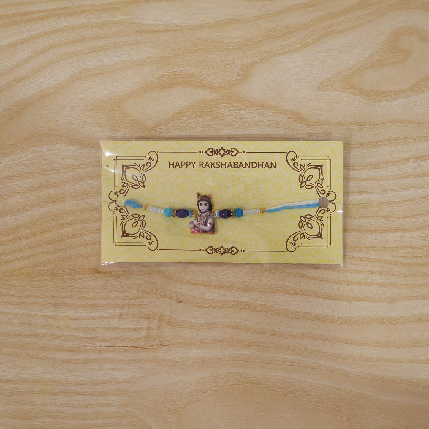 Live shot of Blue Beads Rakhi with intricate beads