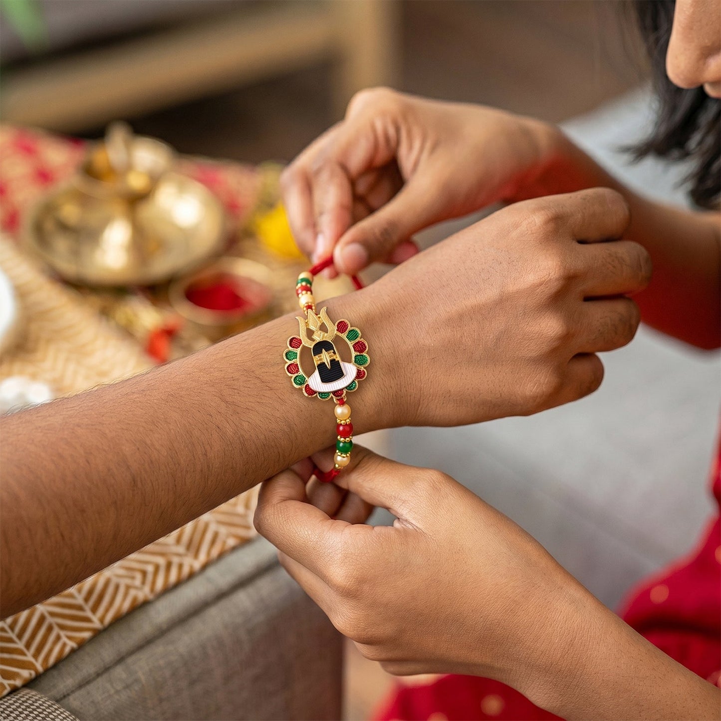Decorative Shivling elements on Rakhi