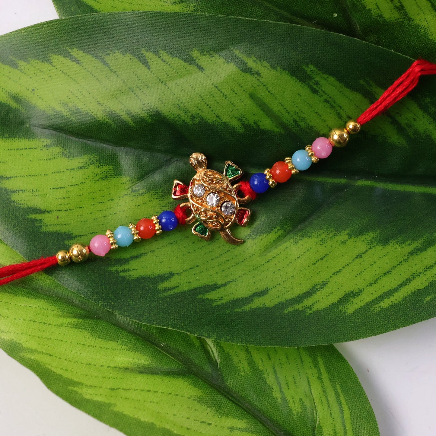 Decorative details of turtle Rakhi for Rakshabandhan