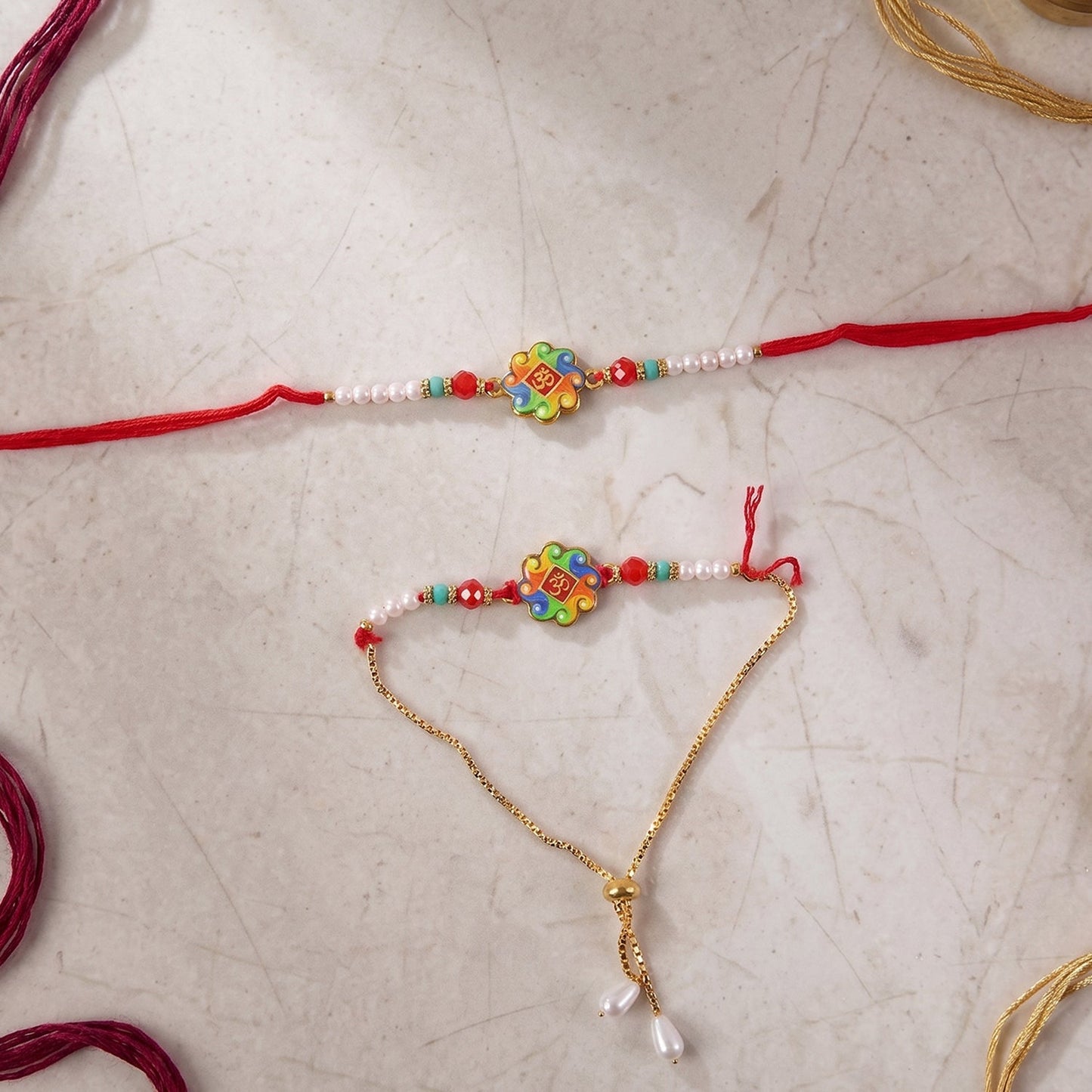 Multiple angles of the Om Symbol Rakhi, highlighting its craftsmanship and pearl accents