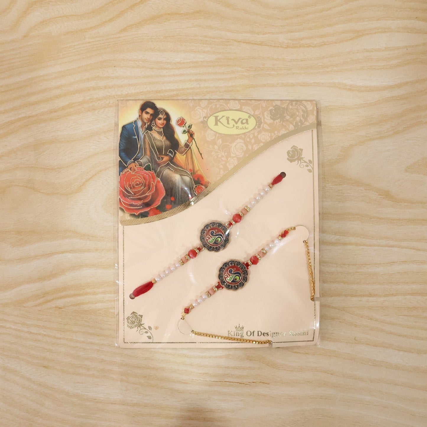 Live shot showing the Classic Peacock Rakhi worn on hand, highlighting craftsmanship